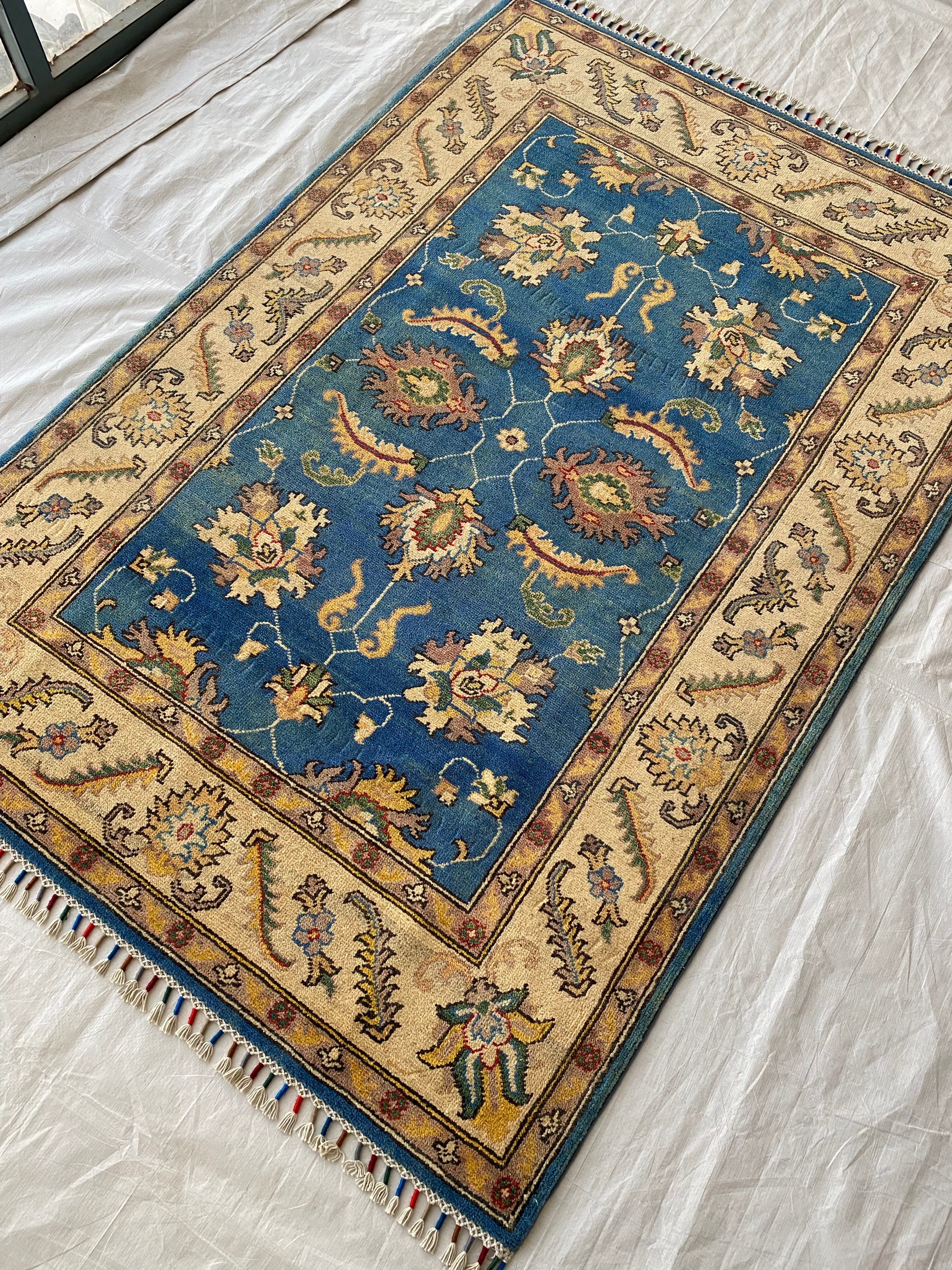 Afghani Rug 4x6 size range tribal Blue Cream laid flat