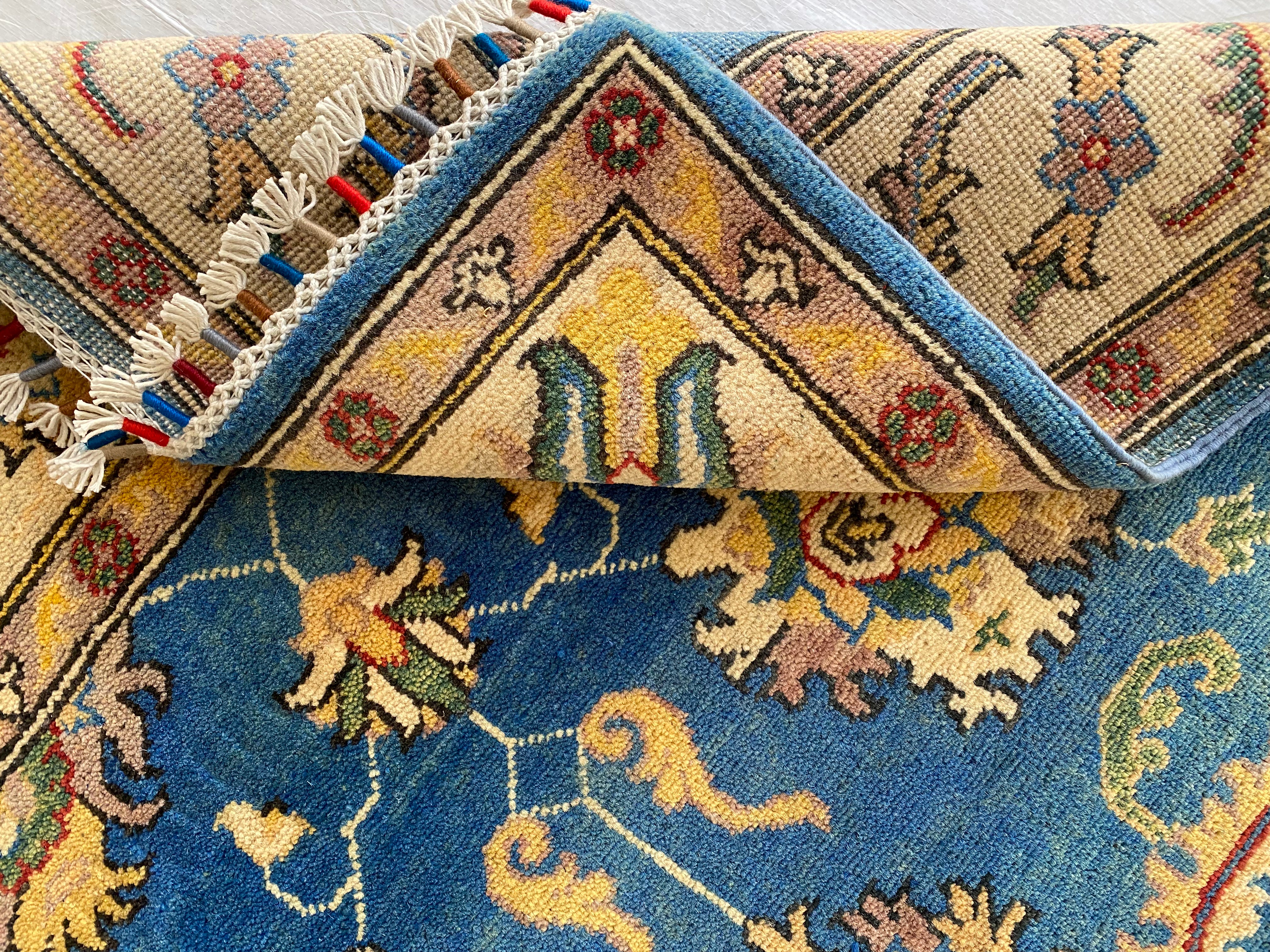 Afghani Rug 4x6 size range tribal Blue Cream laid flat