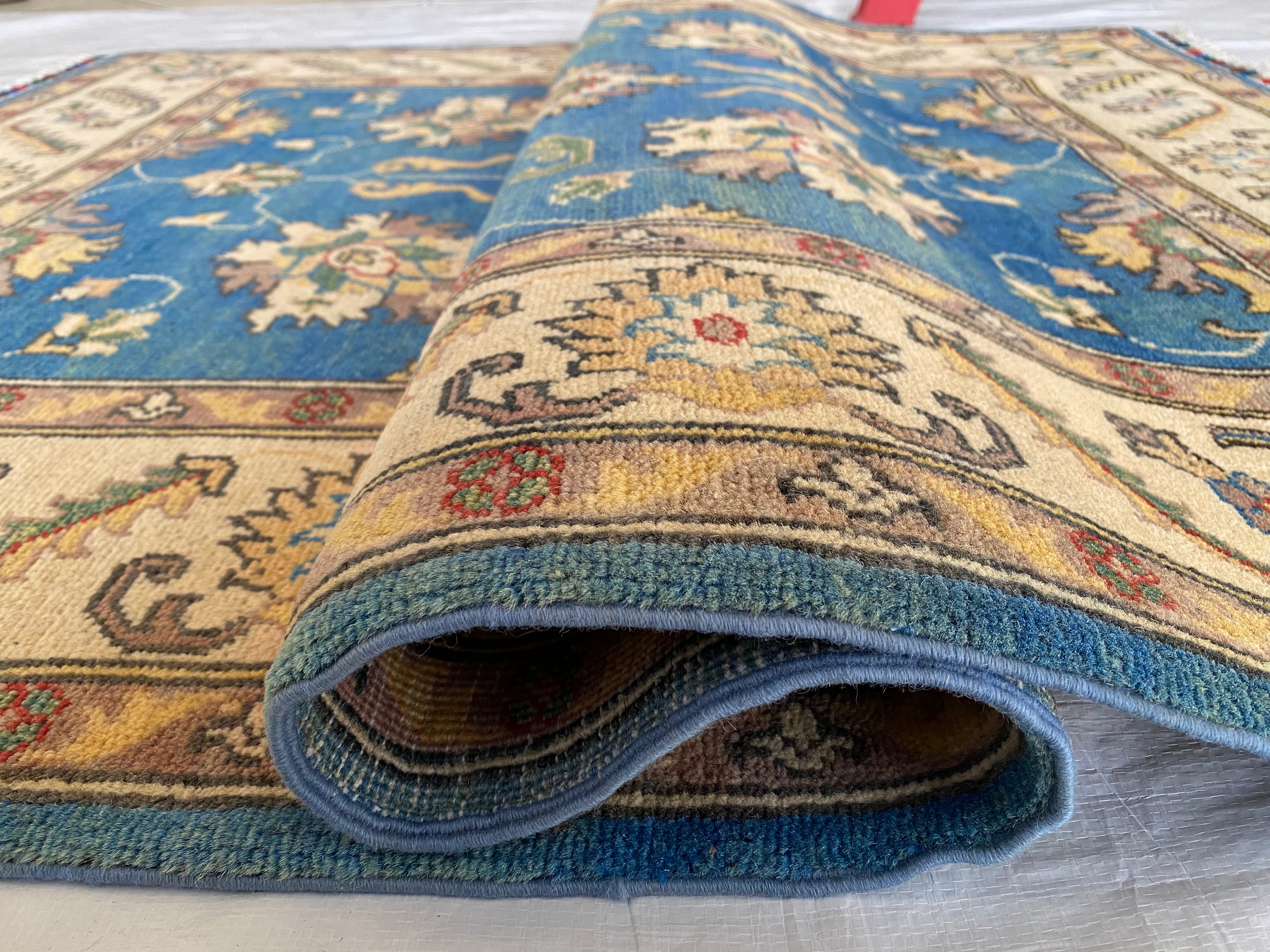 Afghani Rug 4x6 size range tribal Blue Cream laid flat