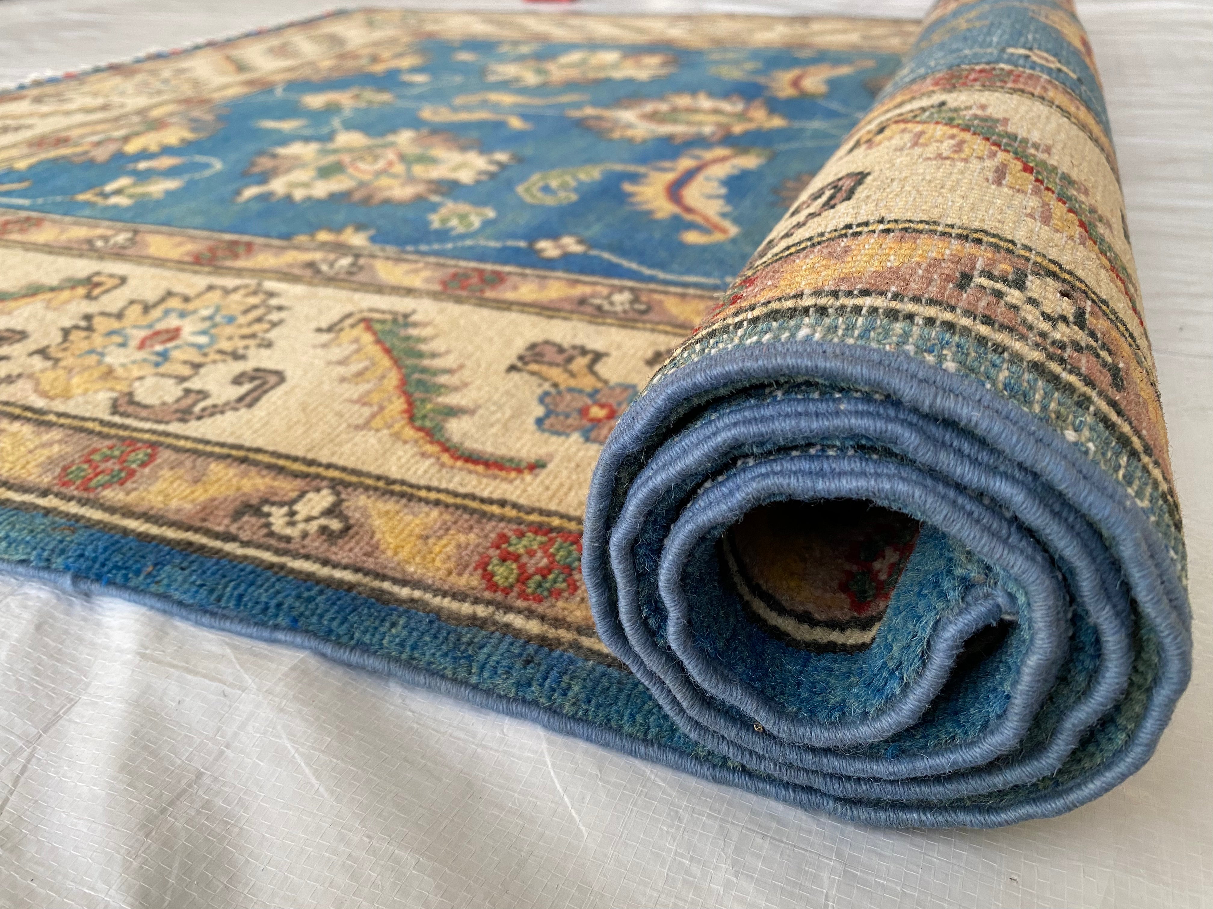 Afghani Rug 4x6 size range tribal Blue Cream laid flat