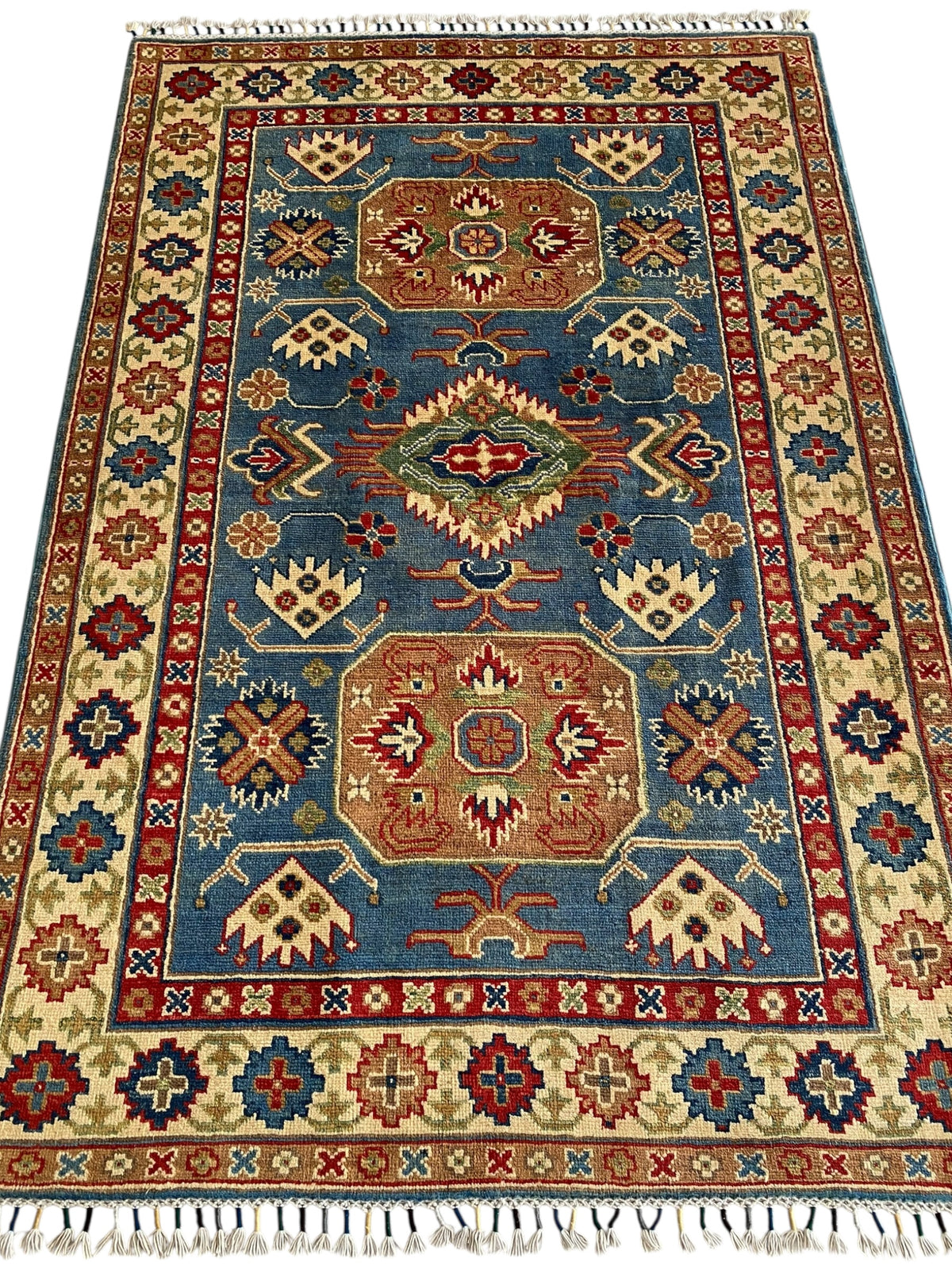 Afghani Rug 4x6 size range tribal Blue Cream laid flat