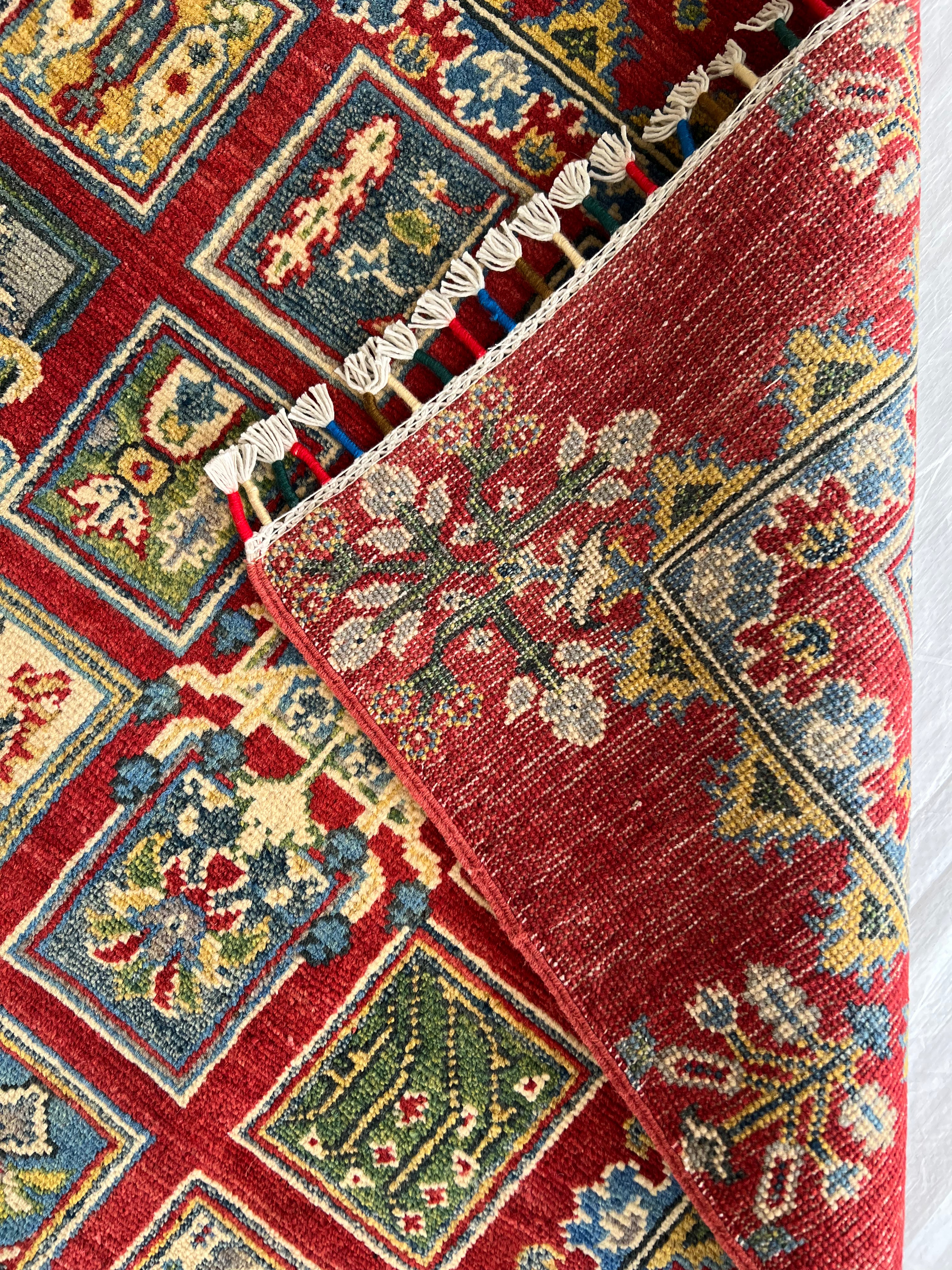 Afghani Rug 5x8 size range tribal Red laid flat