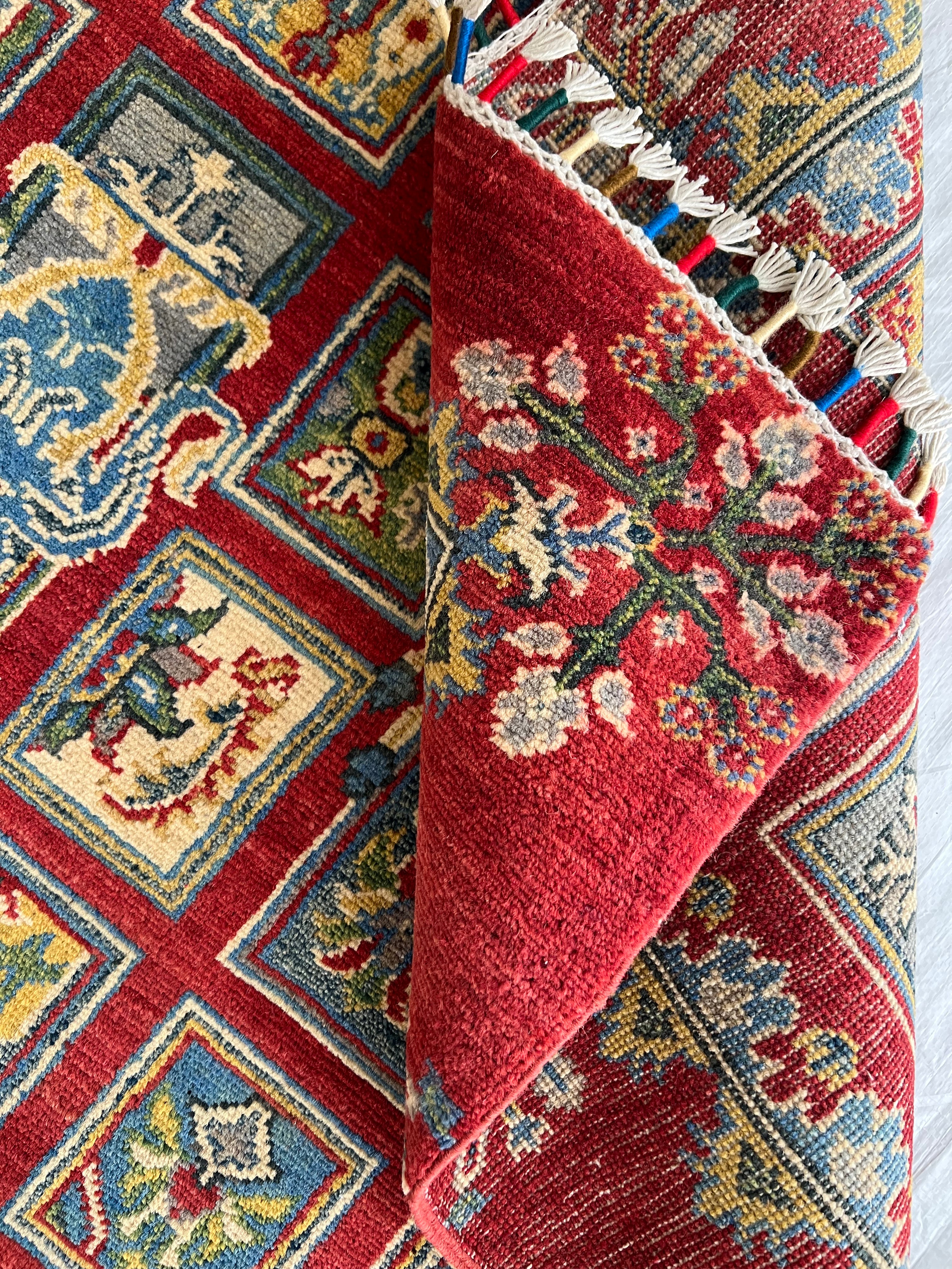 Afghani Rug 5x8 size range tribal Red laid flat