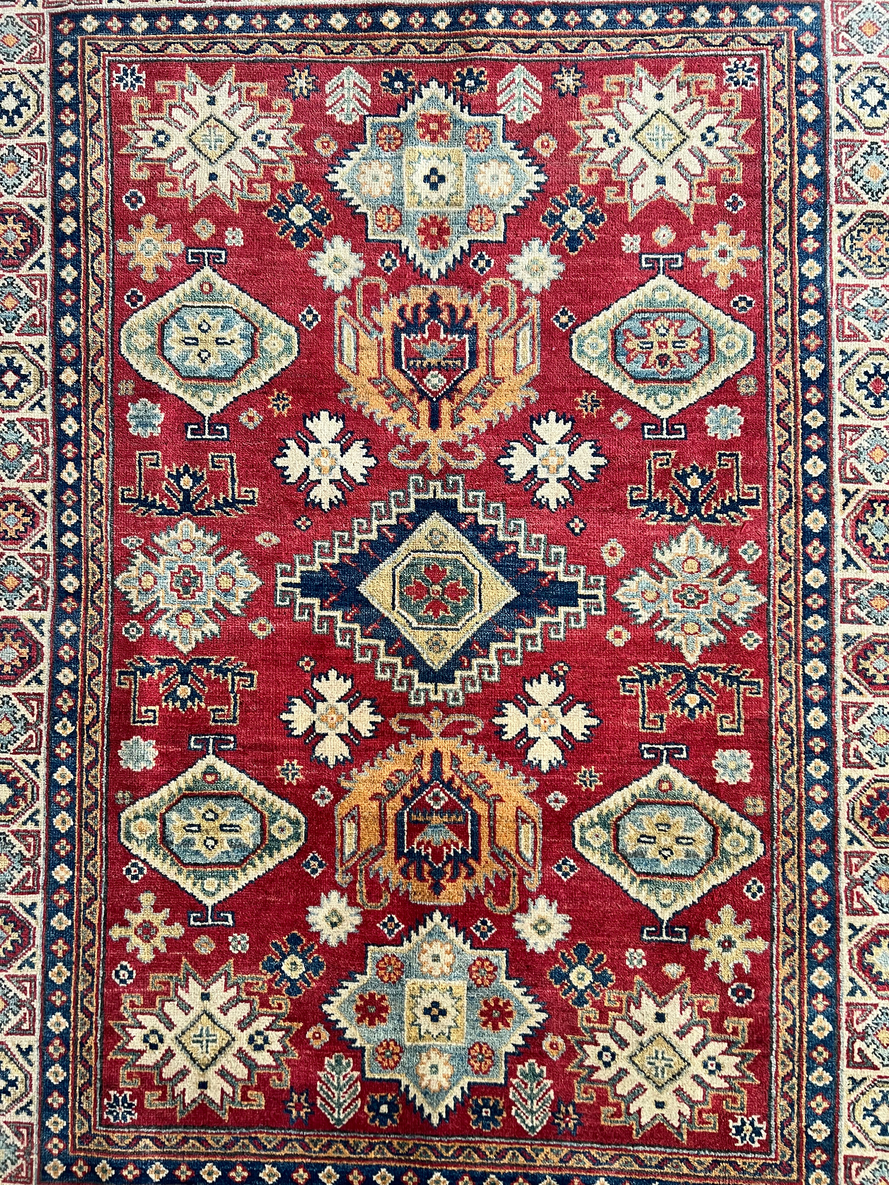 Afghani Rug 5x8 size range tribal Red laid flat