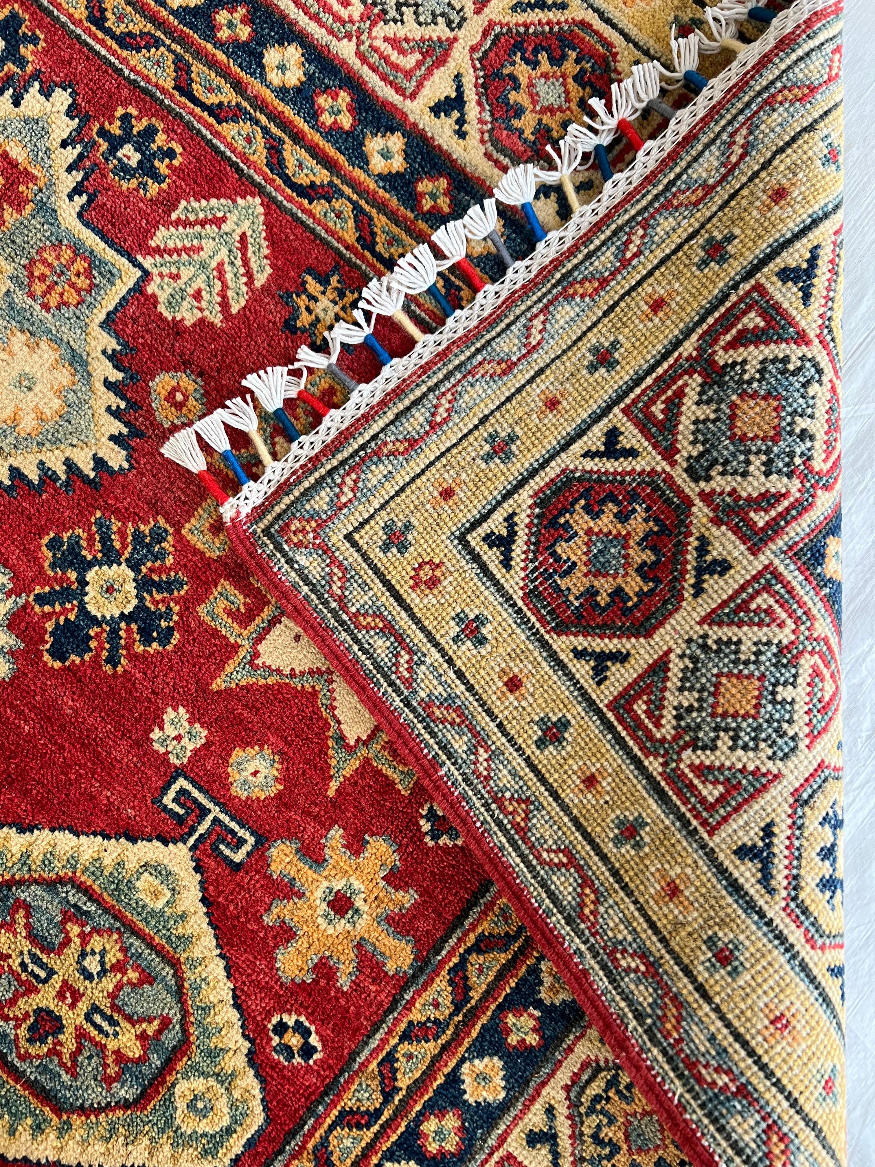 Afghani Rug 5x8 size range tribal Red laid flat