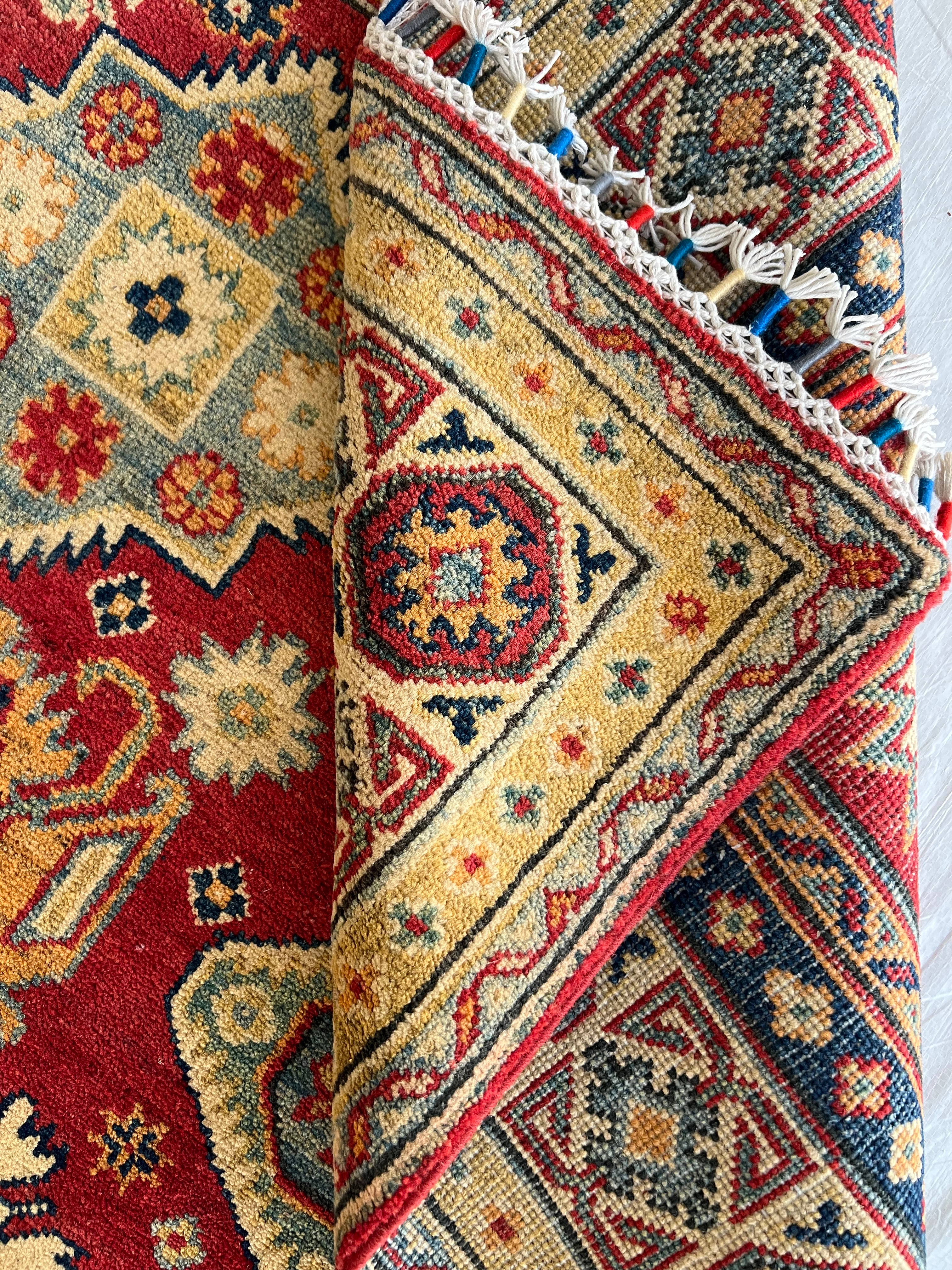 Afghani Rug 5x8 size range tribal Red laid flat