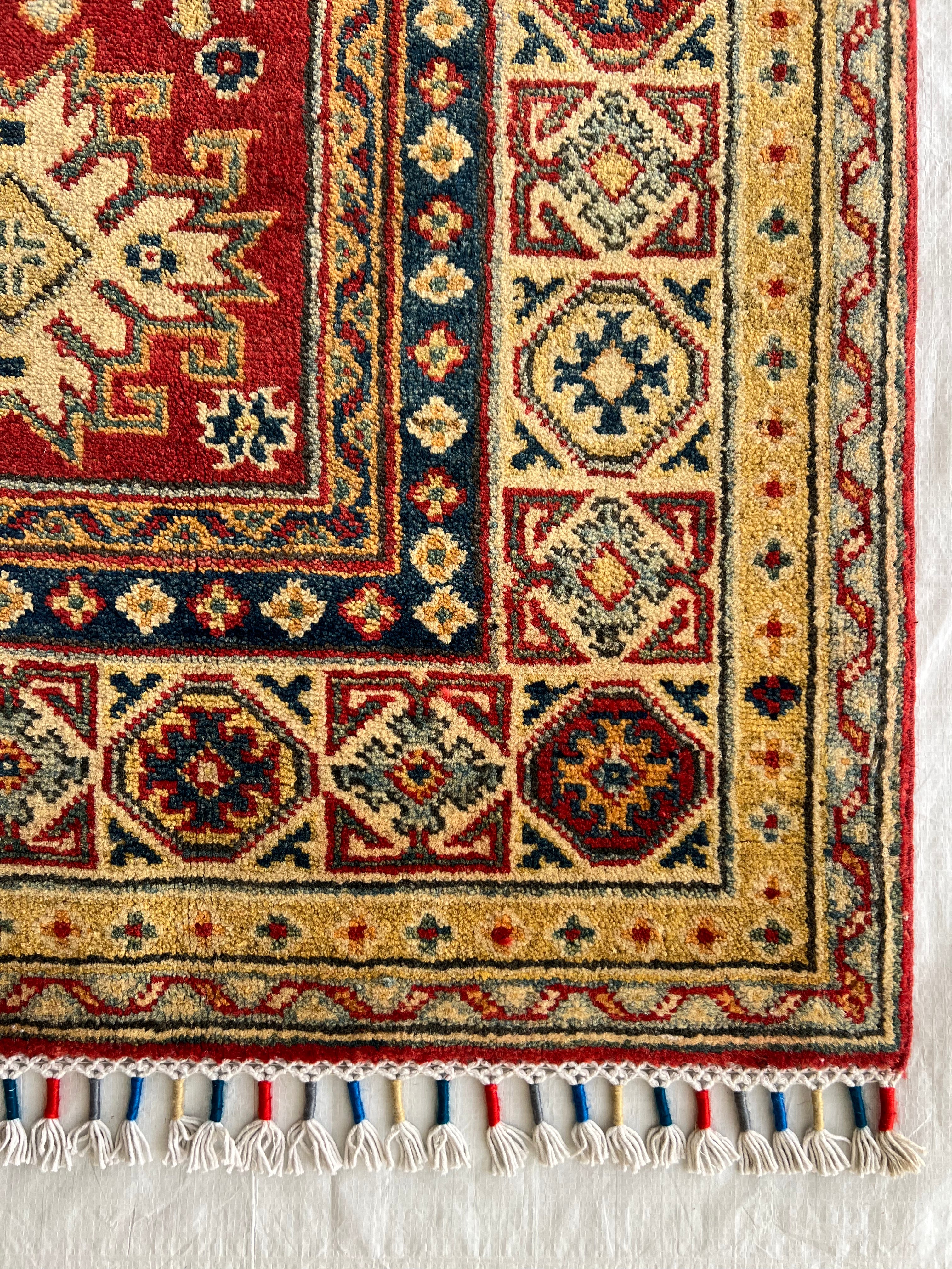 Afghani Rug 5x8 size range tribal Red laid flat