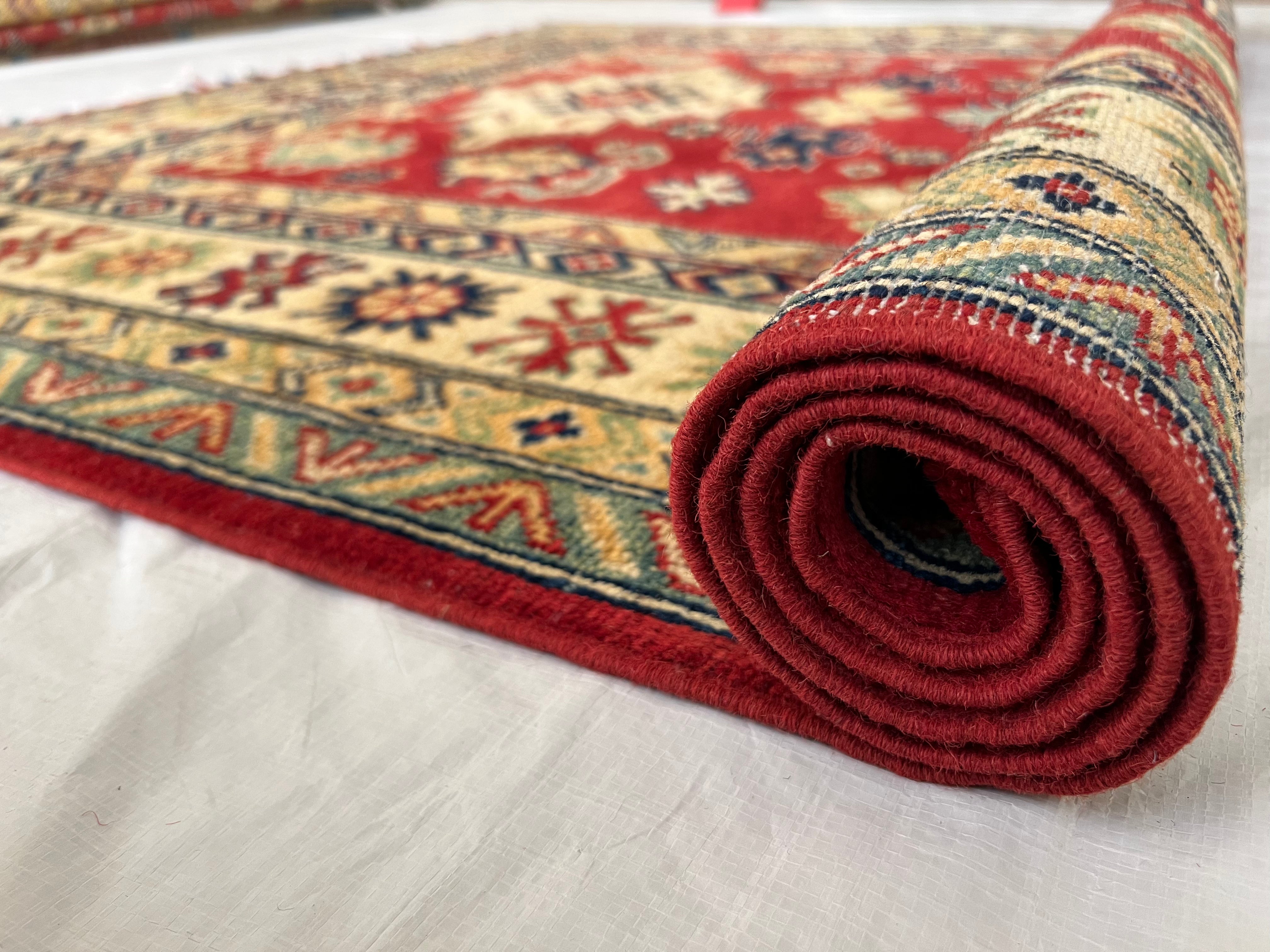 Afghani Rug 5x8 size range tribal Red Cream laid flat