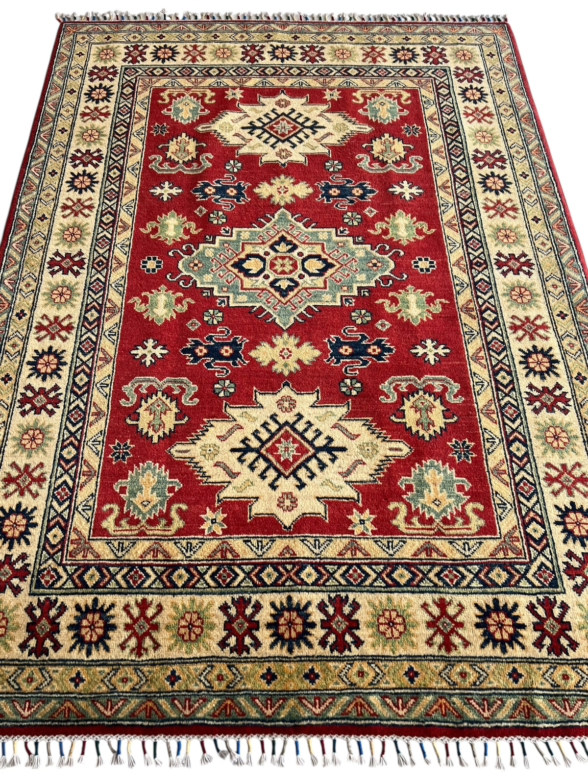 Afghani Rug 5x8 size range tribal Red Cream laid flat