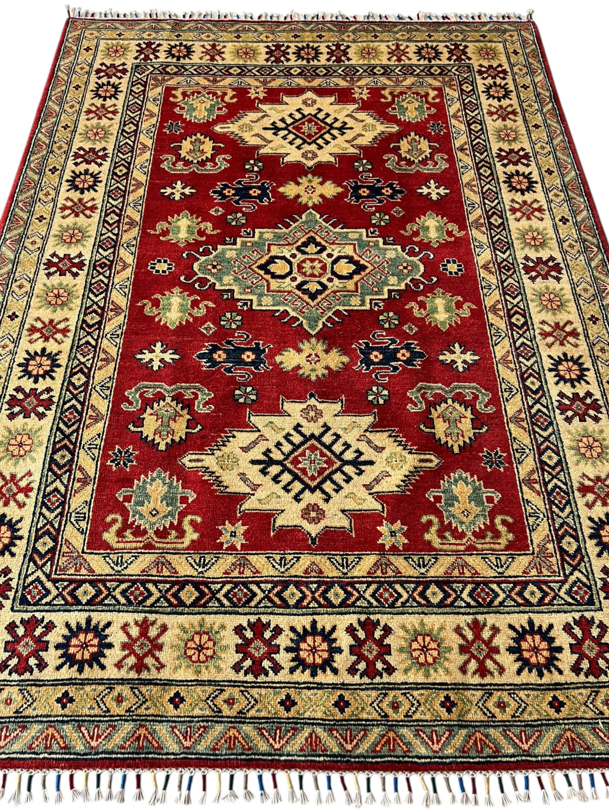 Afghani Rug 5x8 size range tribal Red Cream laid flat