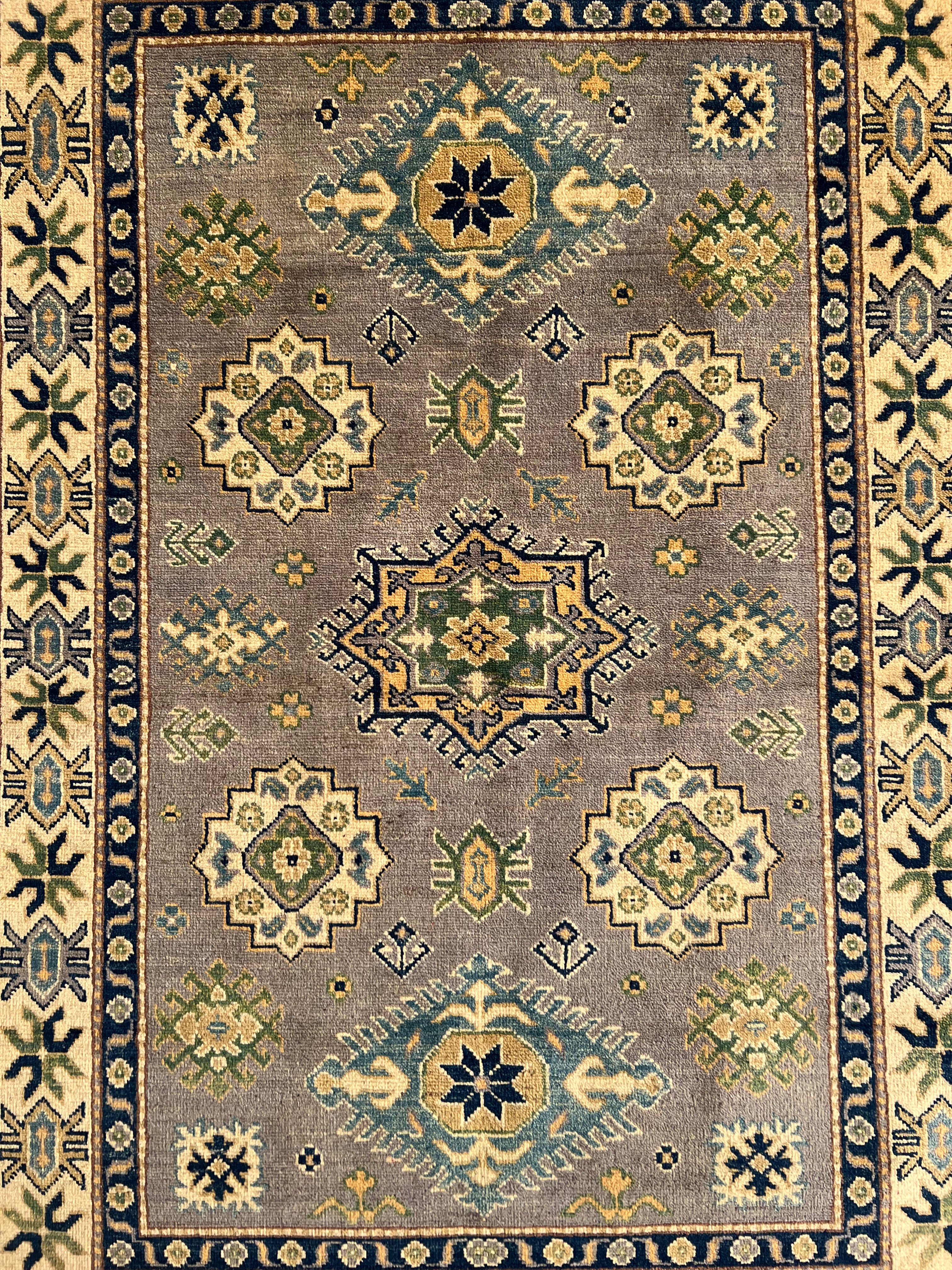 Afghani Rug 4x6 size range tribal Beige laid flat