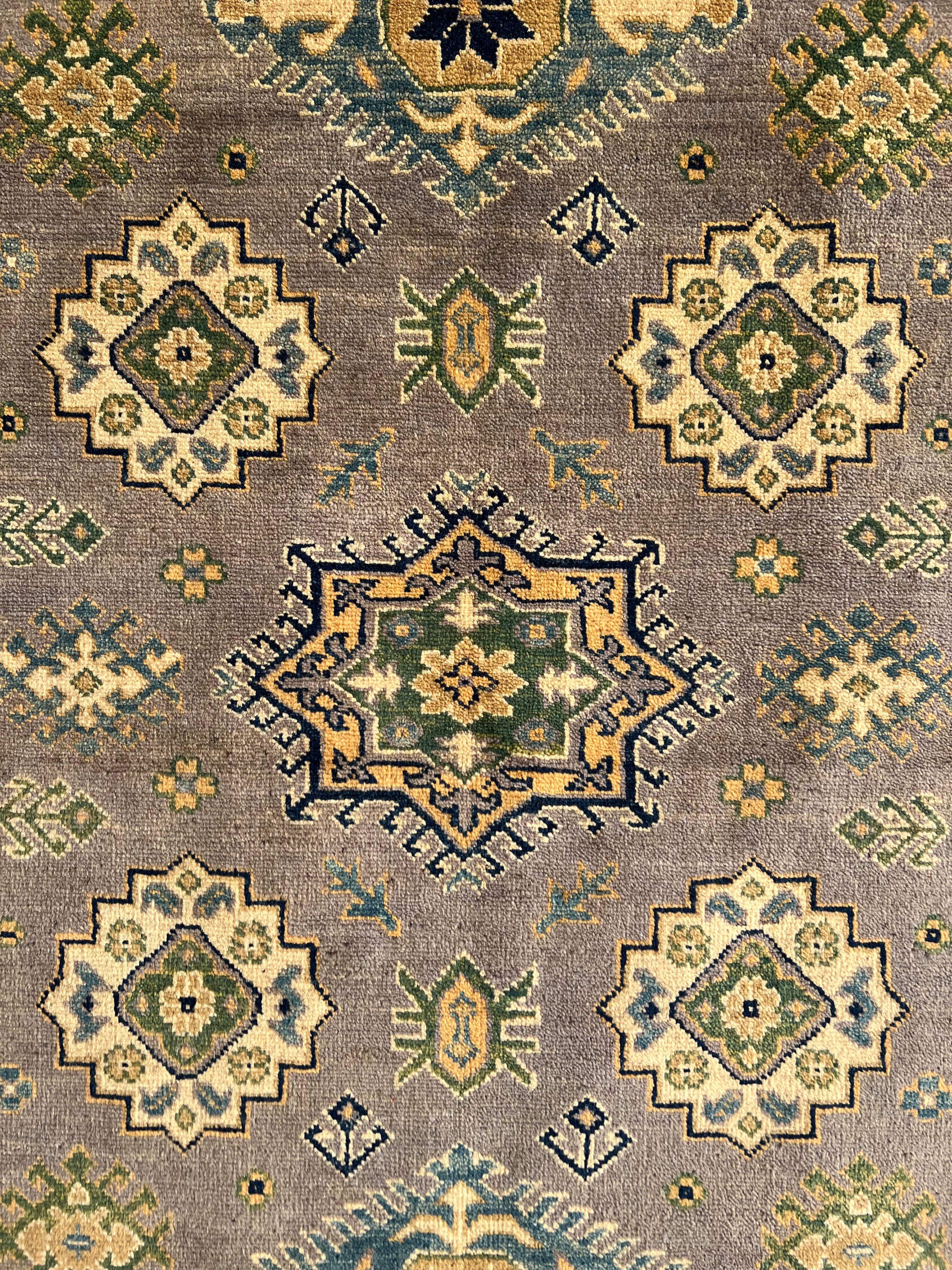 Afghani Rug 4x6 size range tribal Beige laid flat