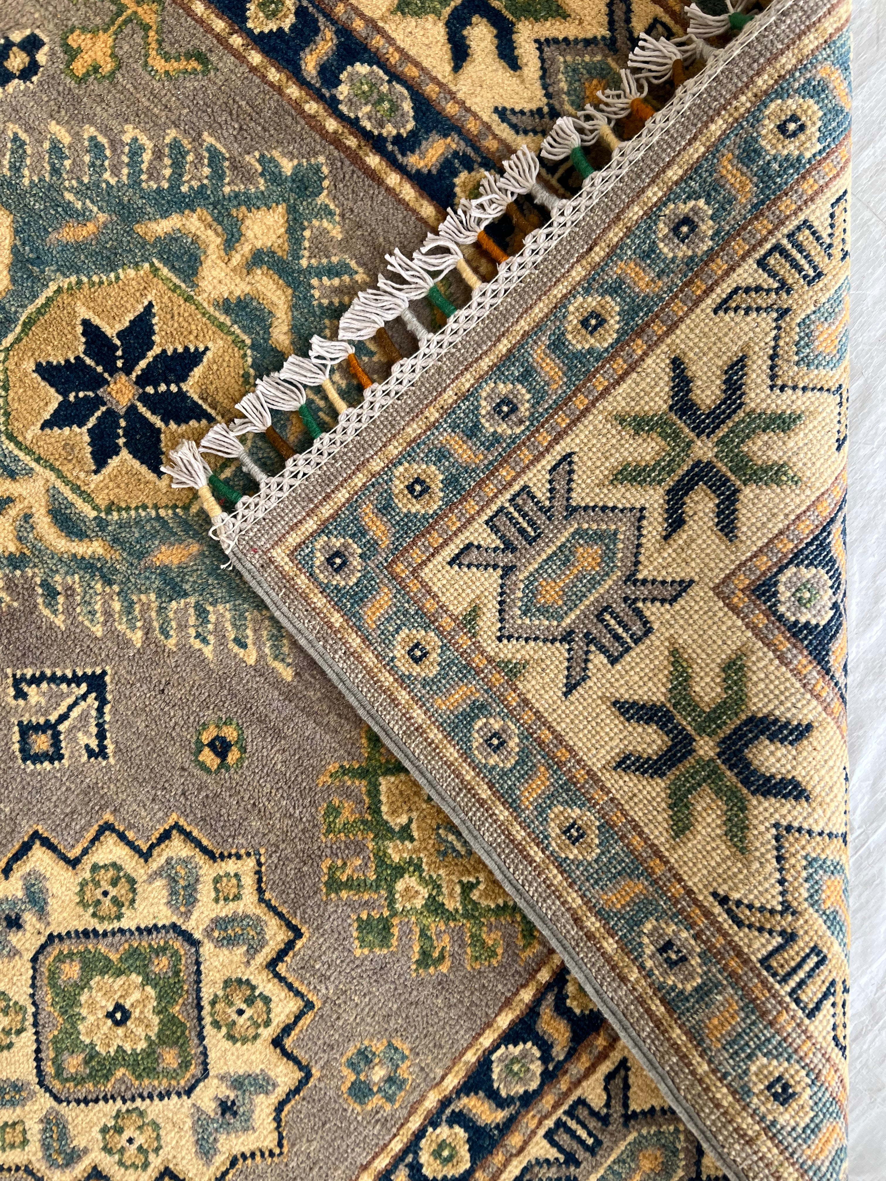 Afghani Rug 4x6 size range tribal Beige laid flat