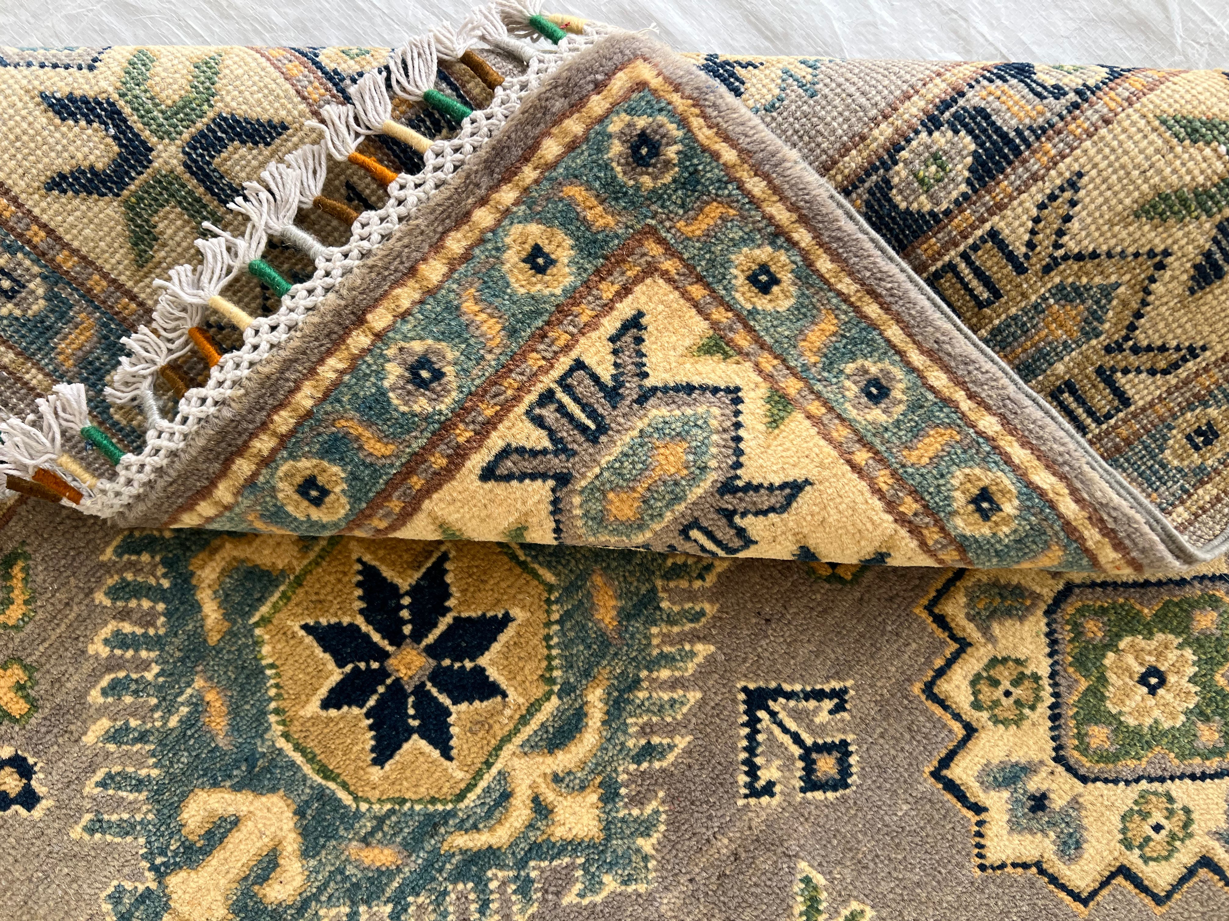 Afghani Rug 4x6 size range tribal Beige laid flat