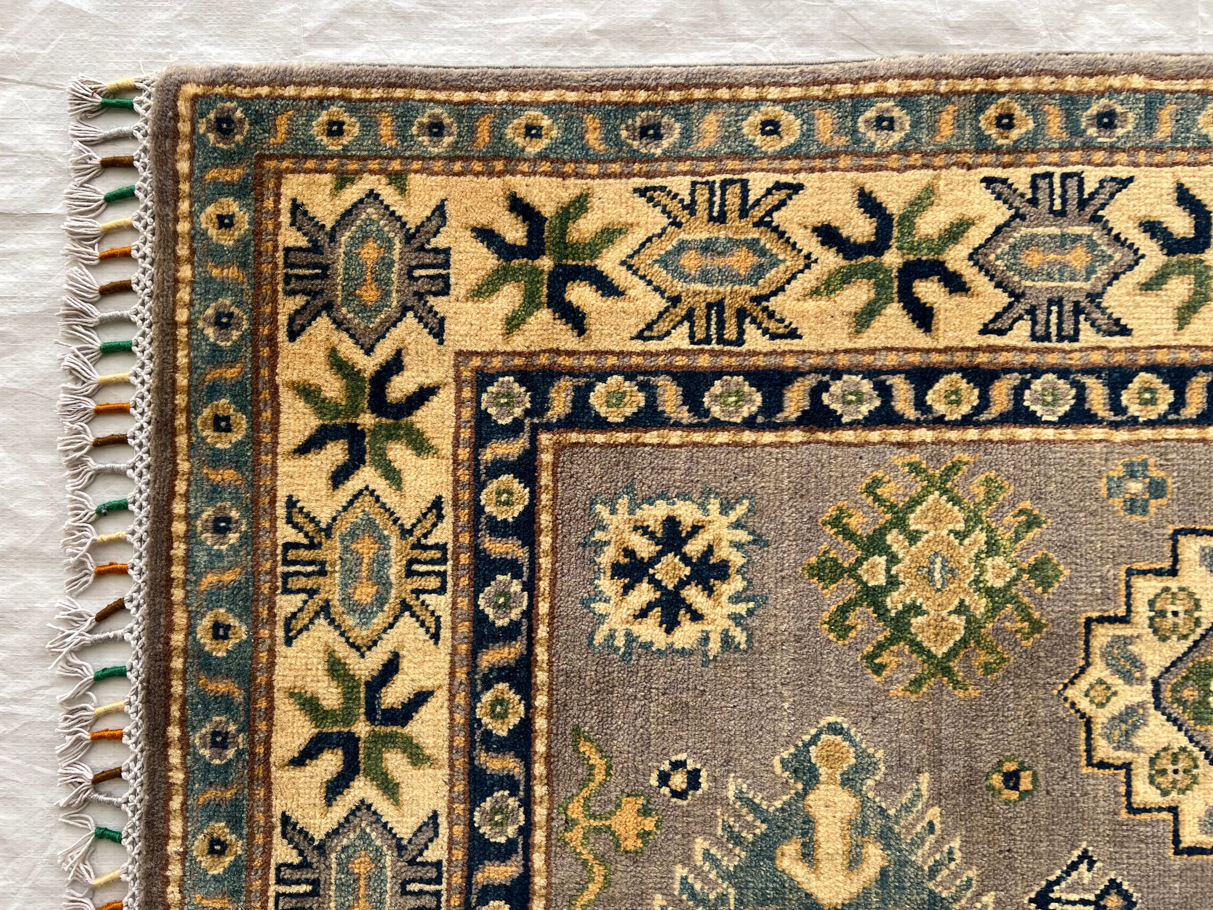 Afghani Rug 4x6 size range tribal Beige laid flat