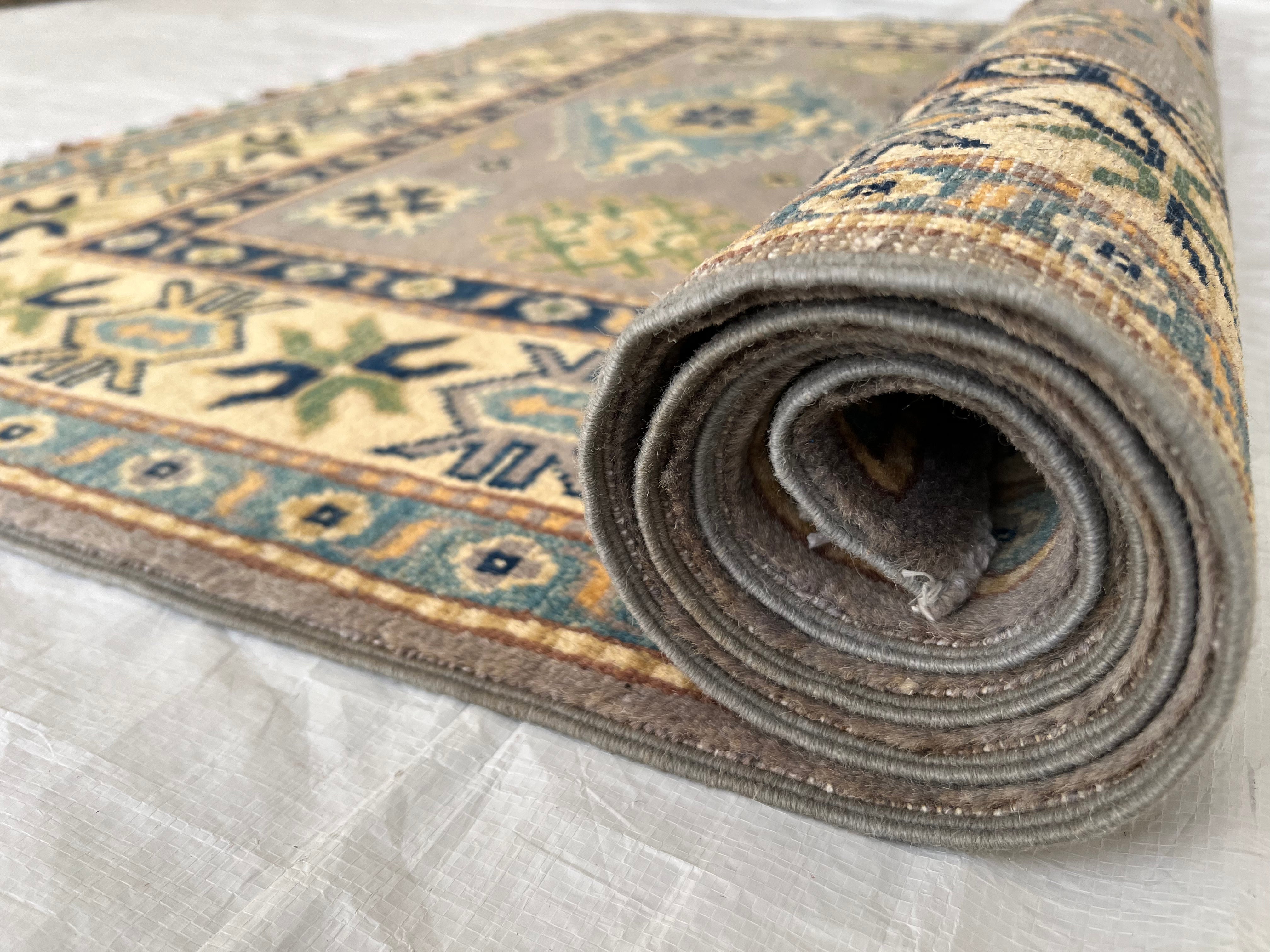 Afghani Rug 4x6 size range tribal Beige laid flat