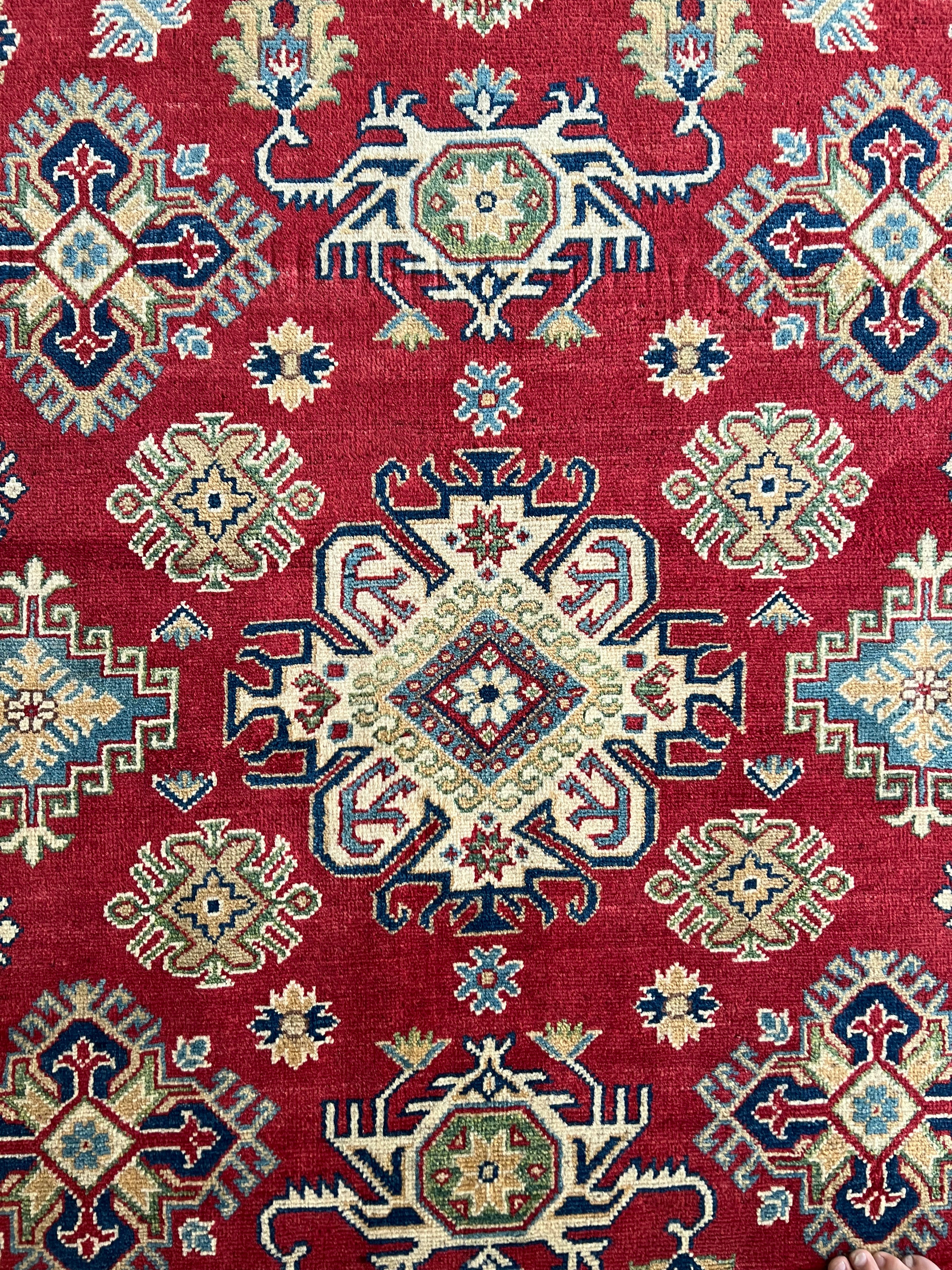 Afghani Rug 6x9 size range tribal Red Cream laid flat