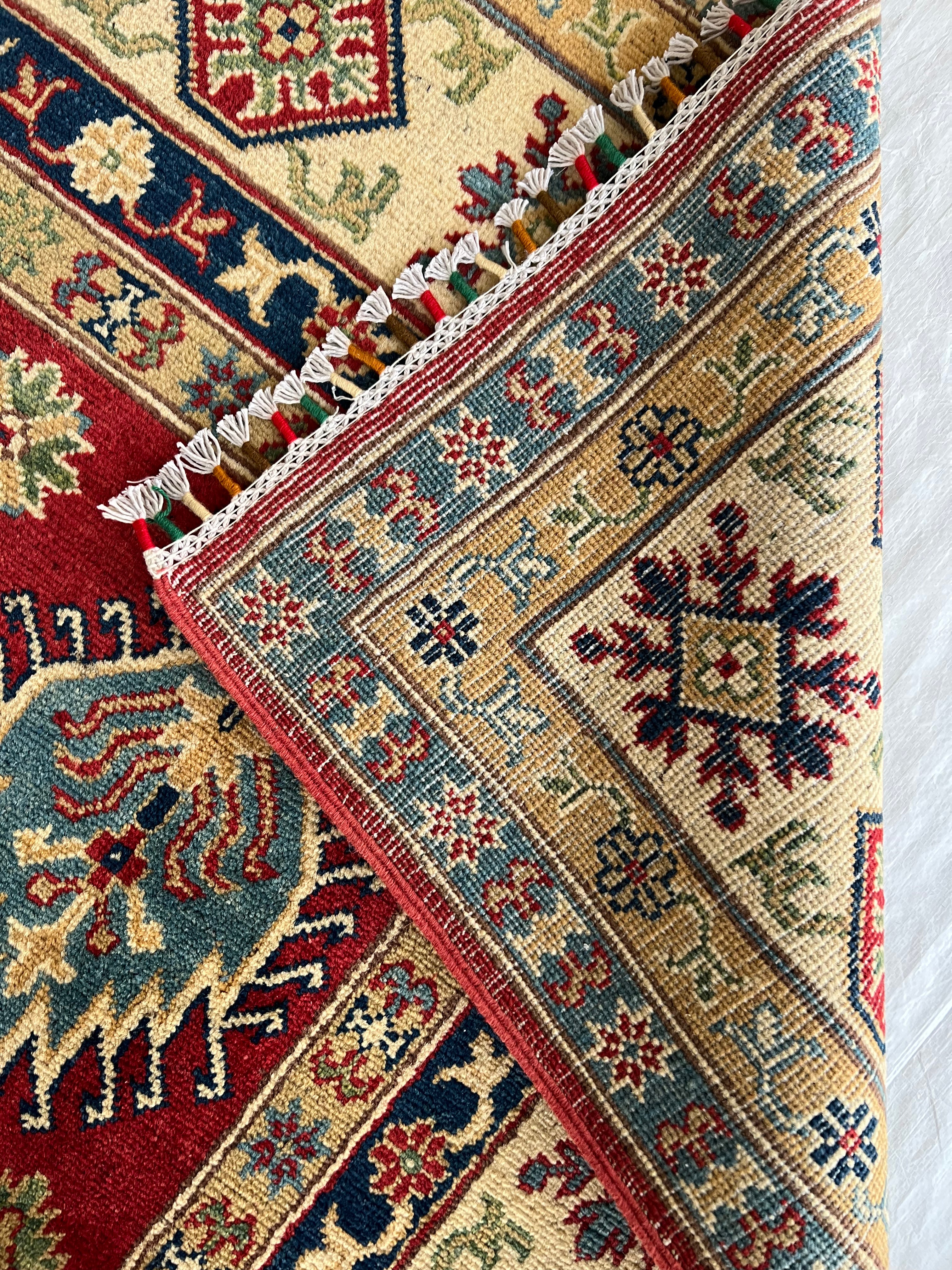Afghani Rug 6x9 size range tribal Red Cream laid flat