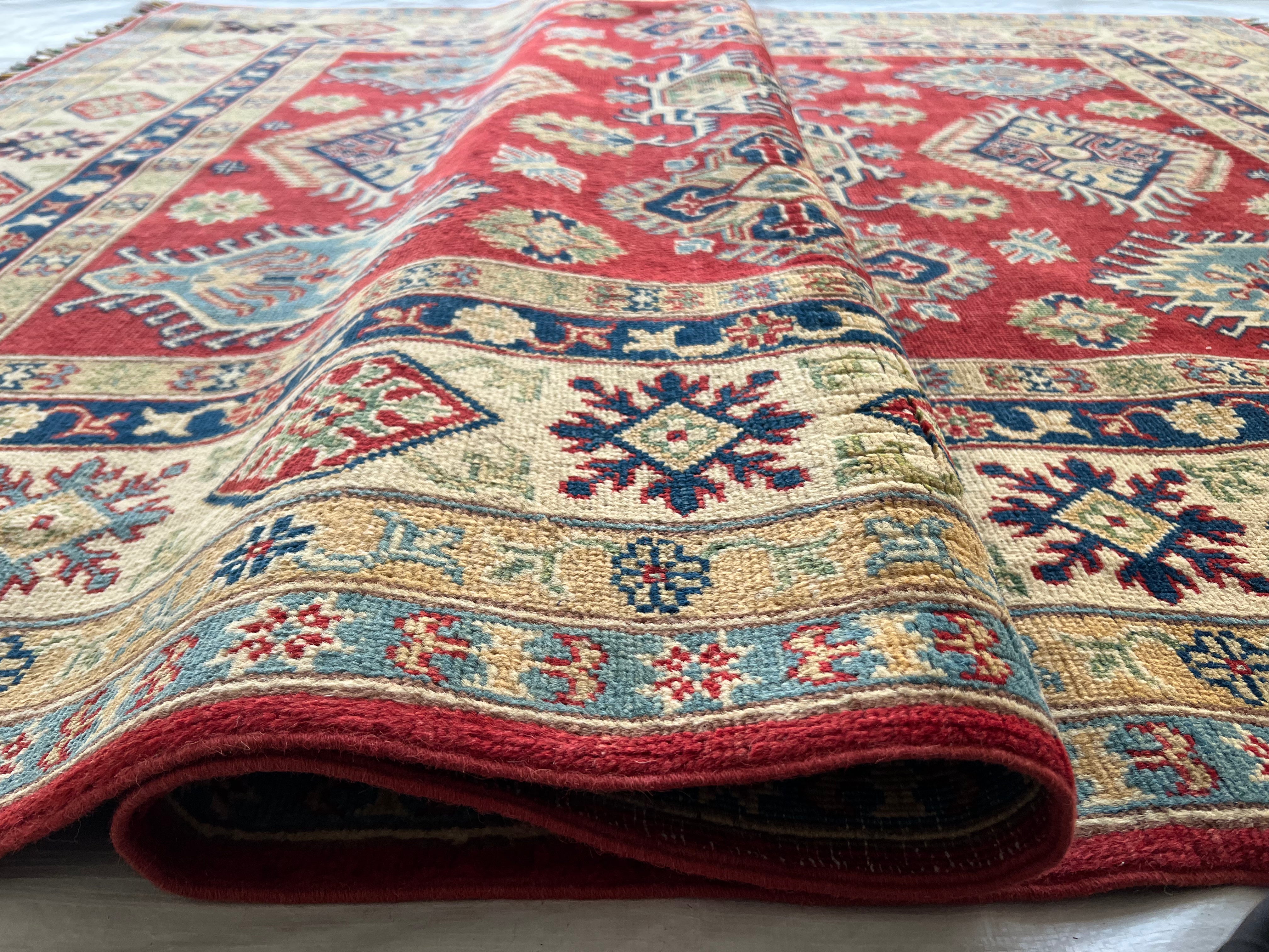 Afghani Rug 6x9 size range tribal Red Cream laid flat