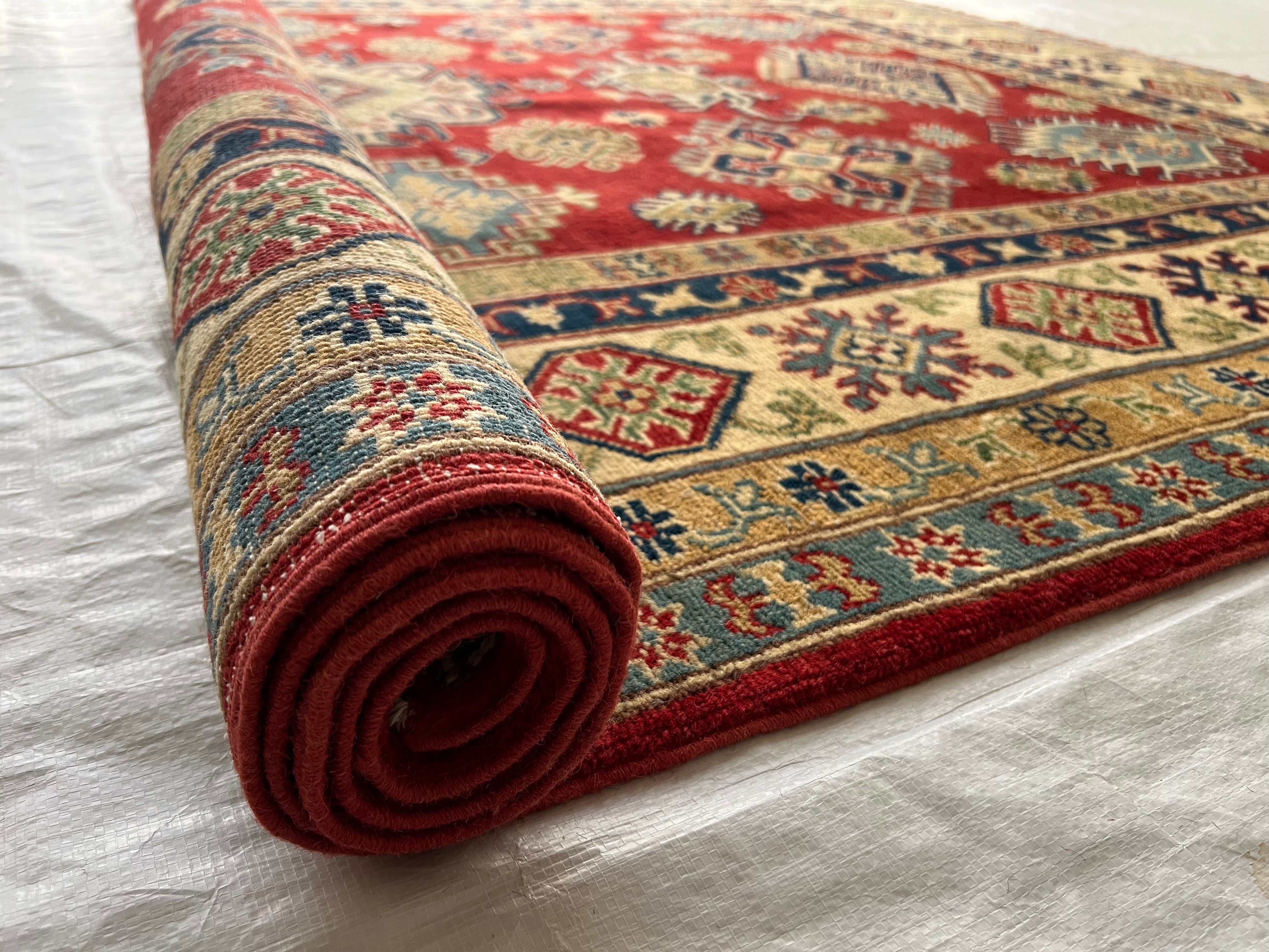 Afghani Rug 6x9 size range tribal Red Cream laid flat