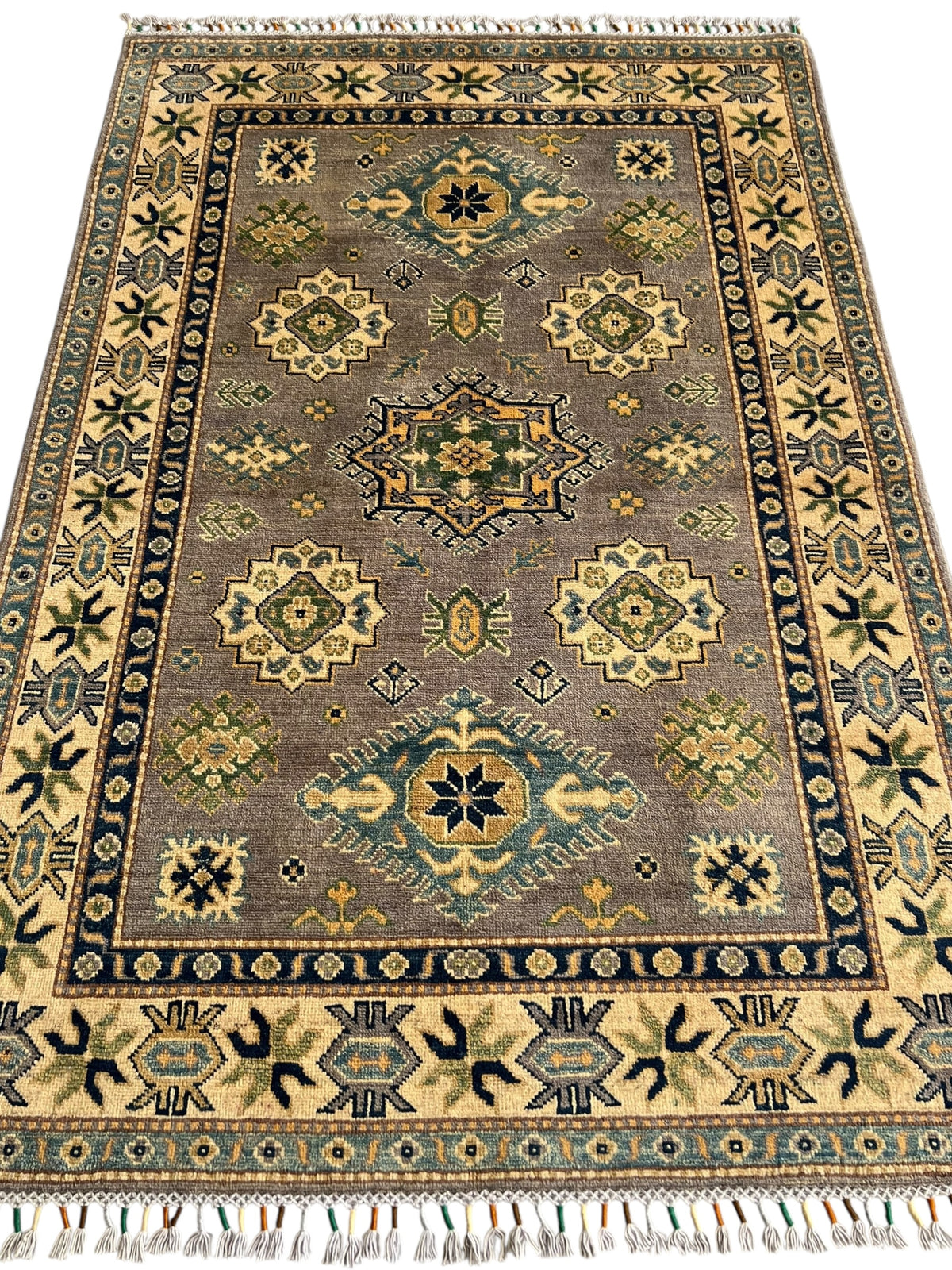Afghani Rug 4x6 size range tribal Beige laid flat