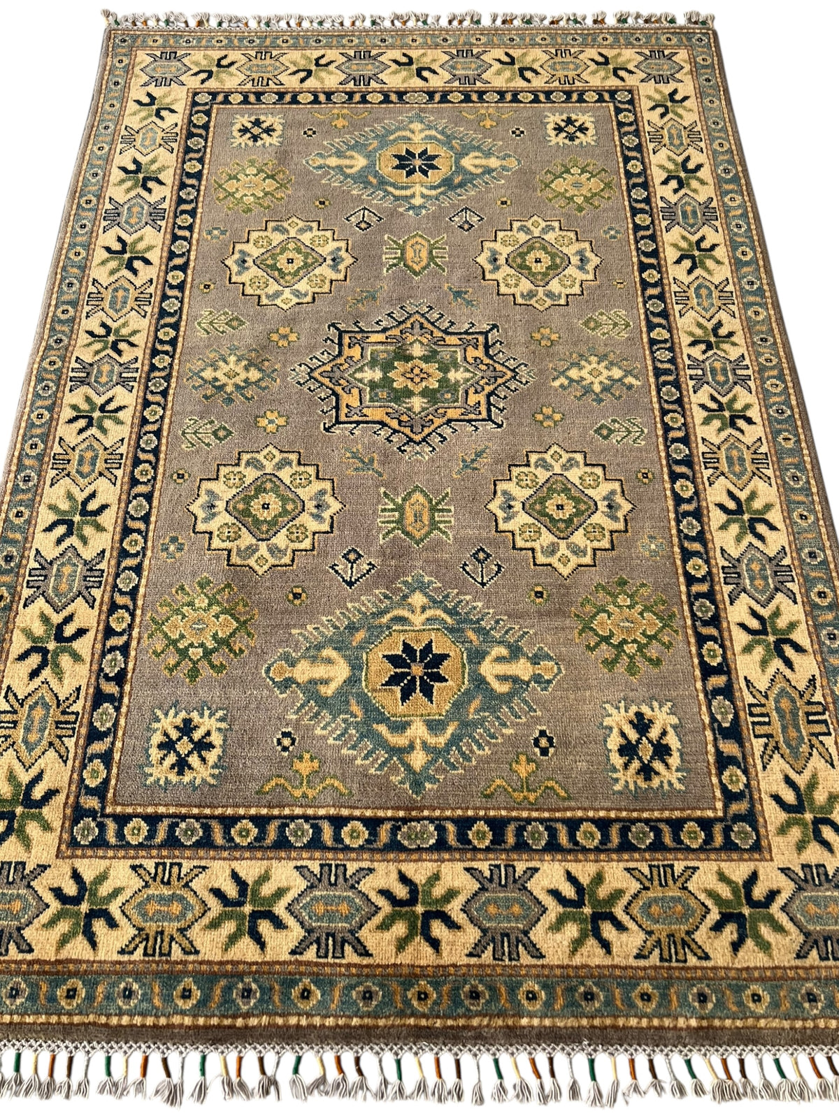 Afghani Rug 4x6 size range tribal Beige laid flat