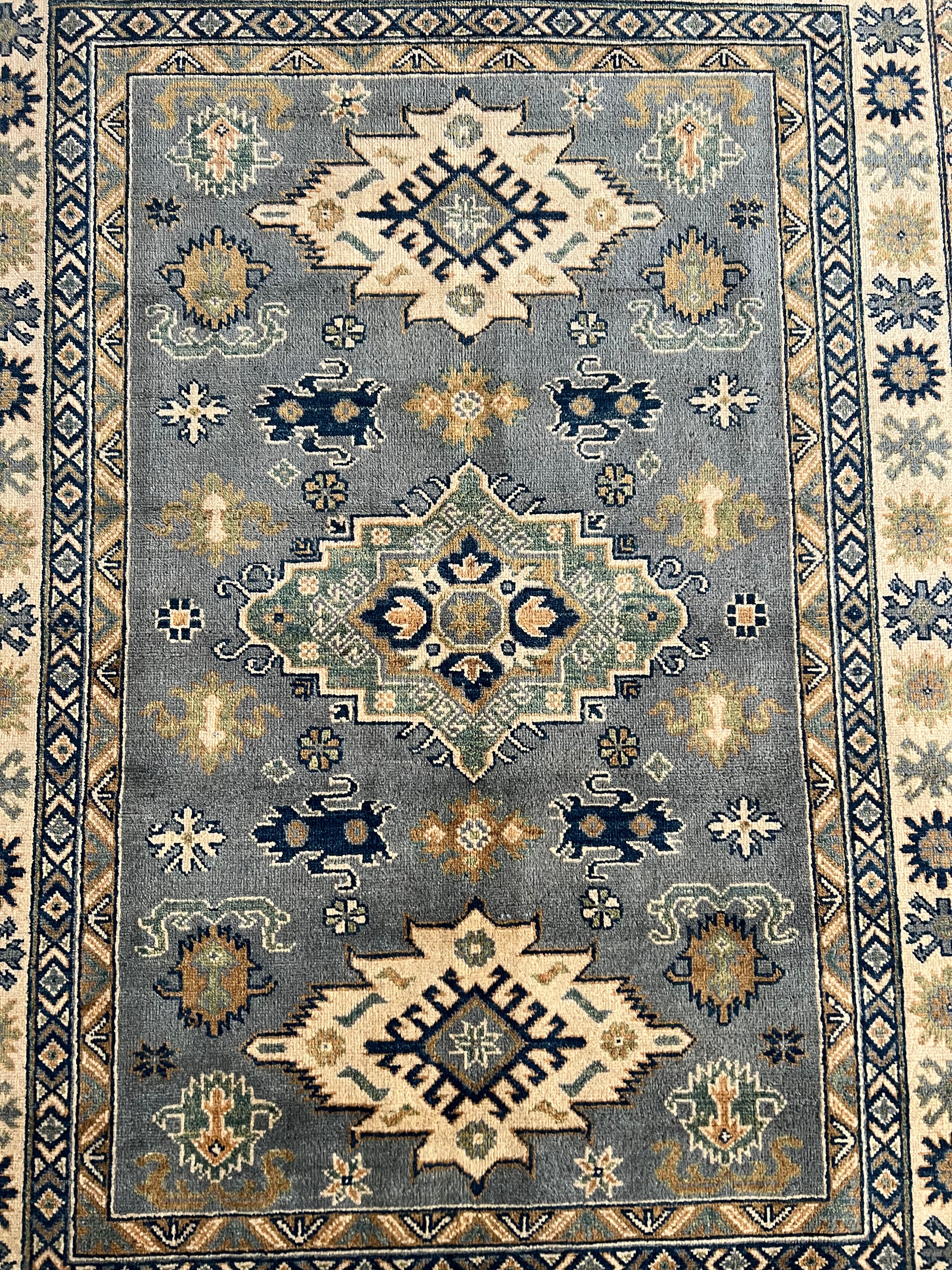 Afghani Rug 5x8 size range tribal laid flat