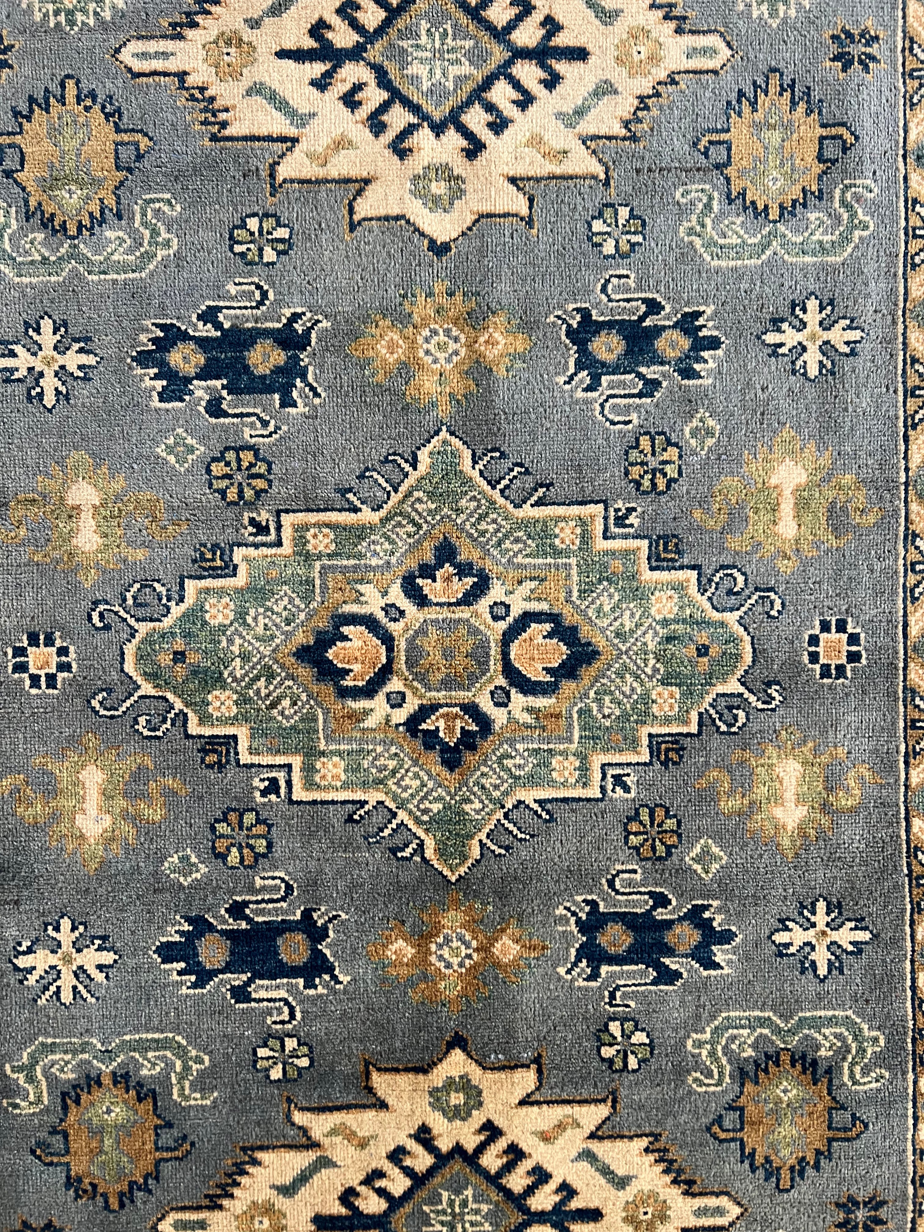 Afghani Rug 5x8 size range tribal laid flat