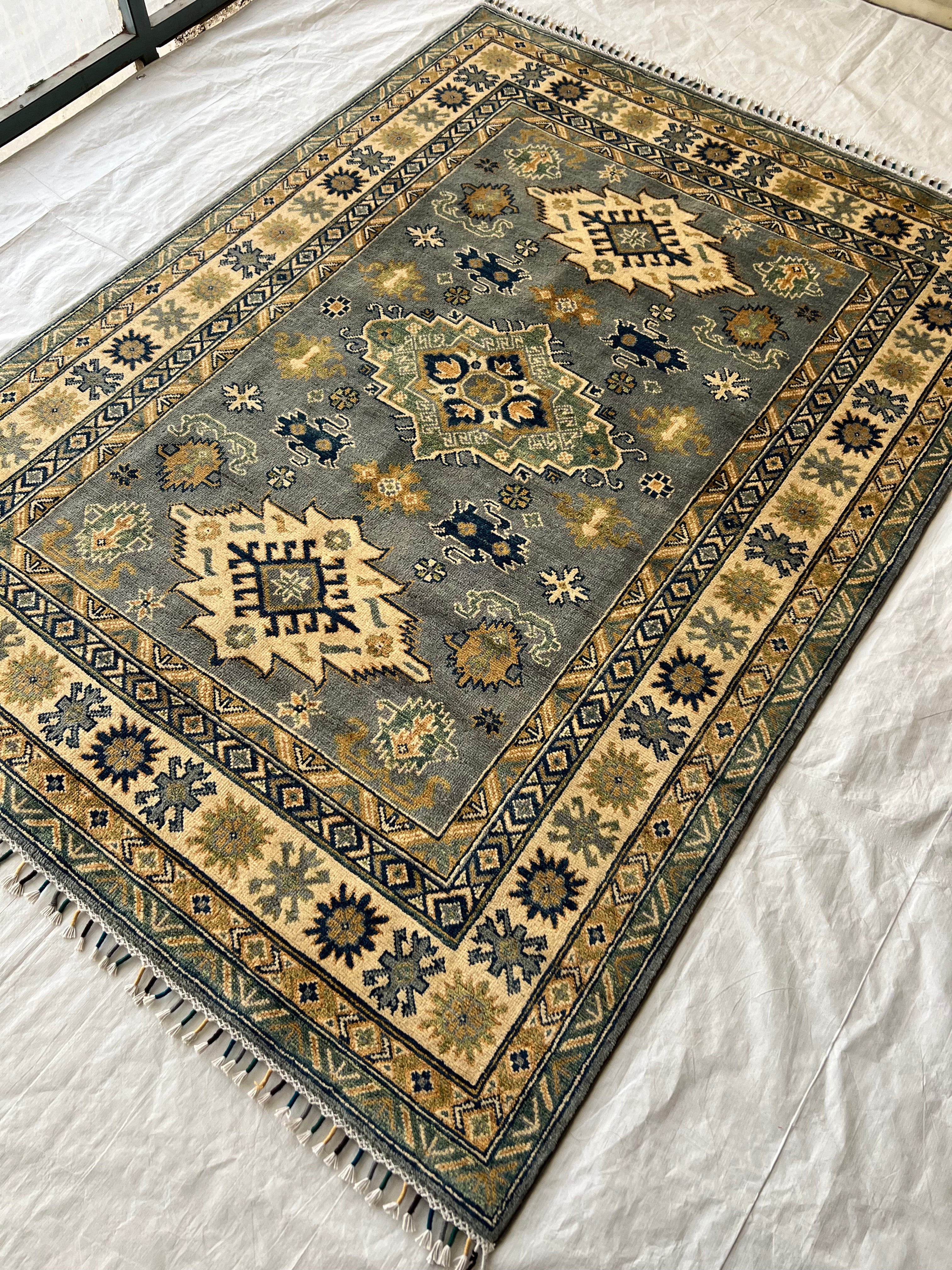 Afghani Rug 5x8 size range tribal laid flat