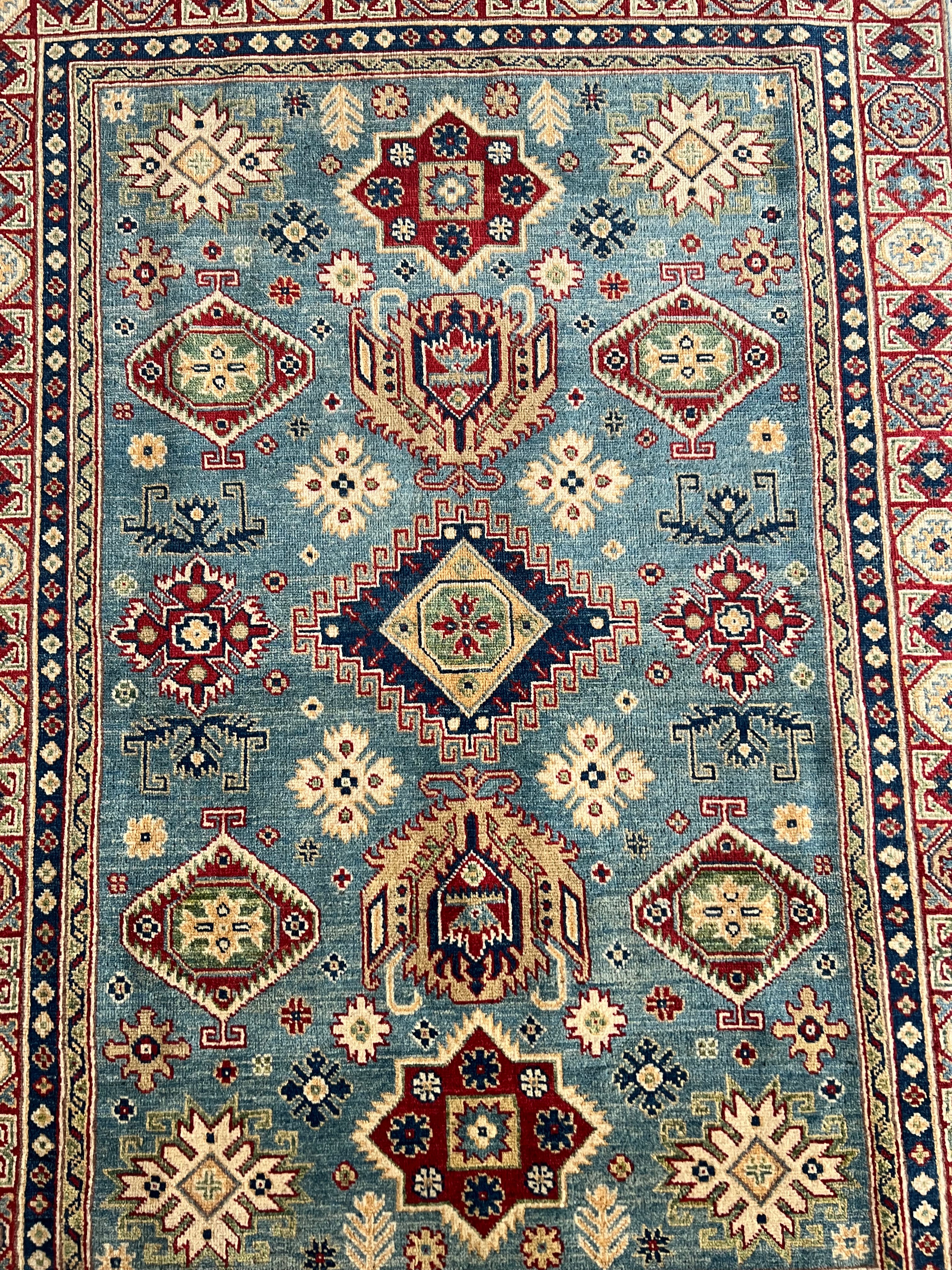 Afghani Rug 5x8 size range tribal laid flat