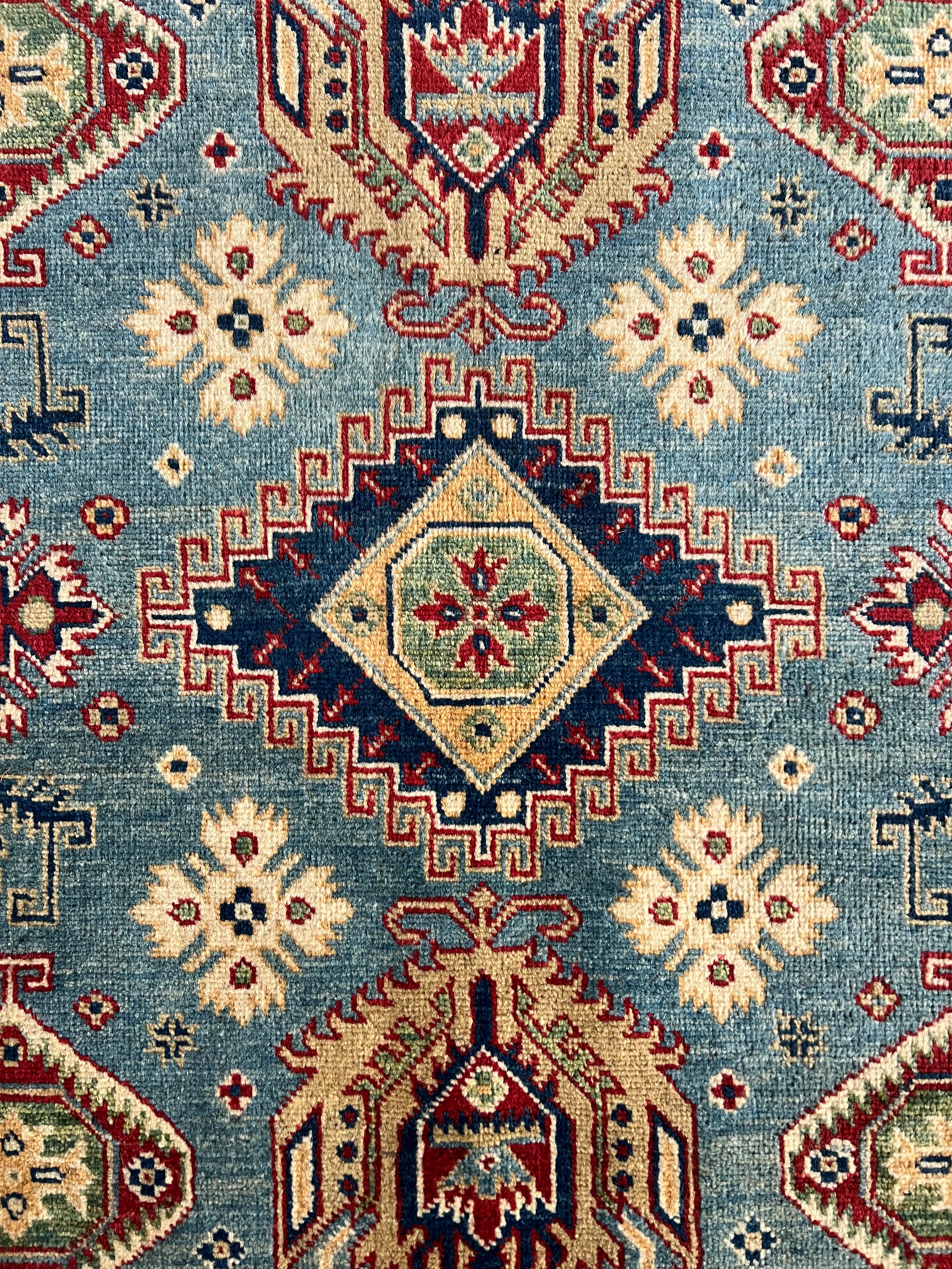 Afghani Rug 5x8 size range tribal laid flat