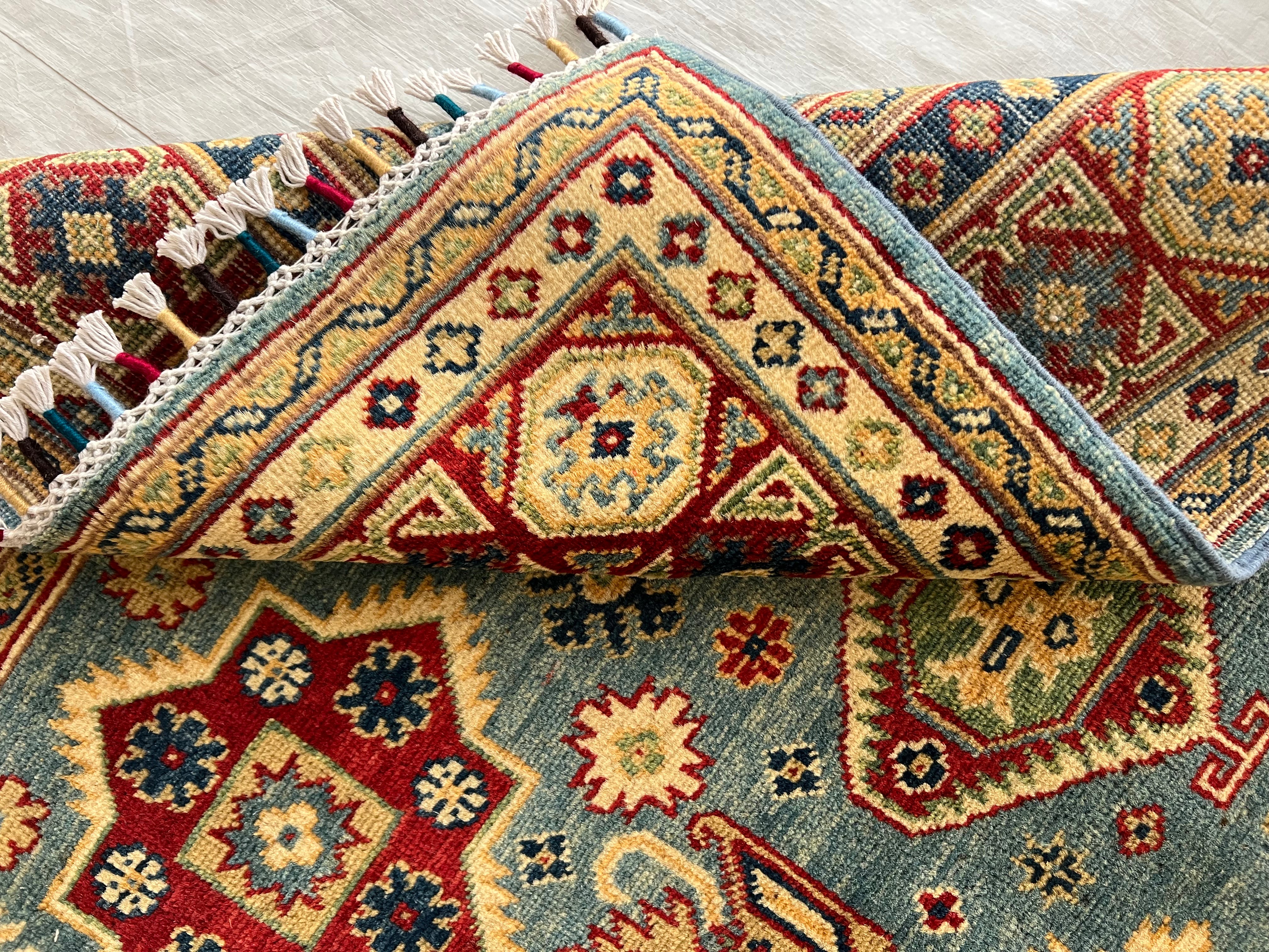 Afghani Rug 5x8 size range tribal laid flat