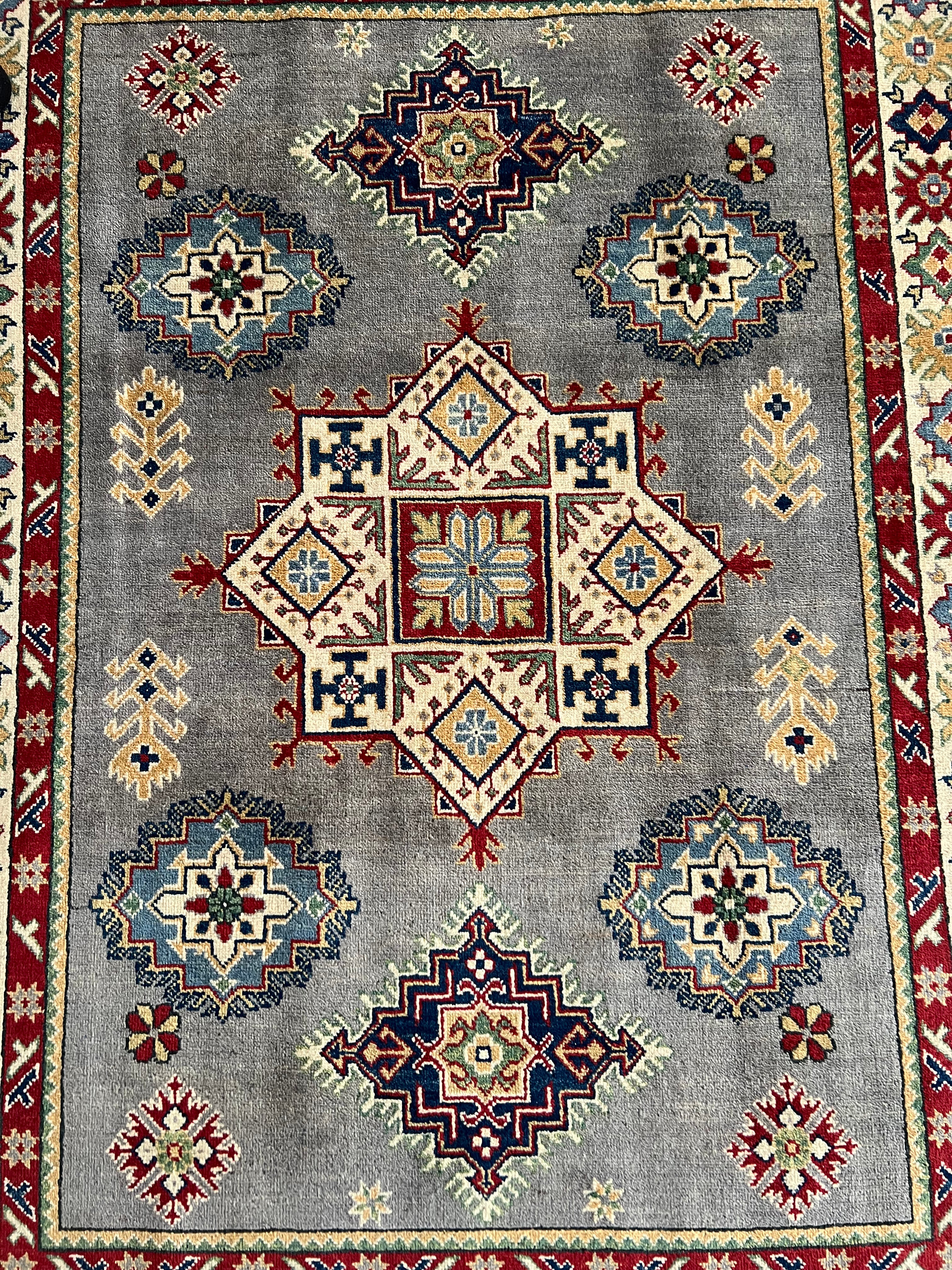Afghani Rug 5x8 size range tribal Cream laid flat