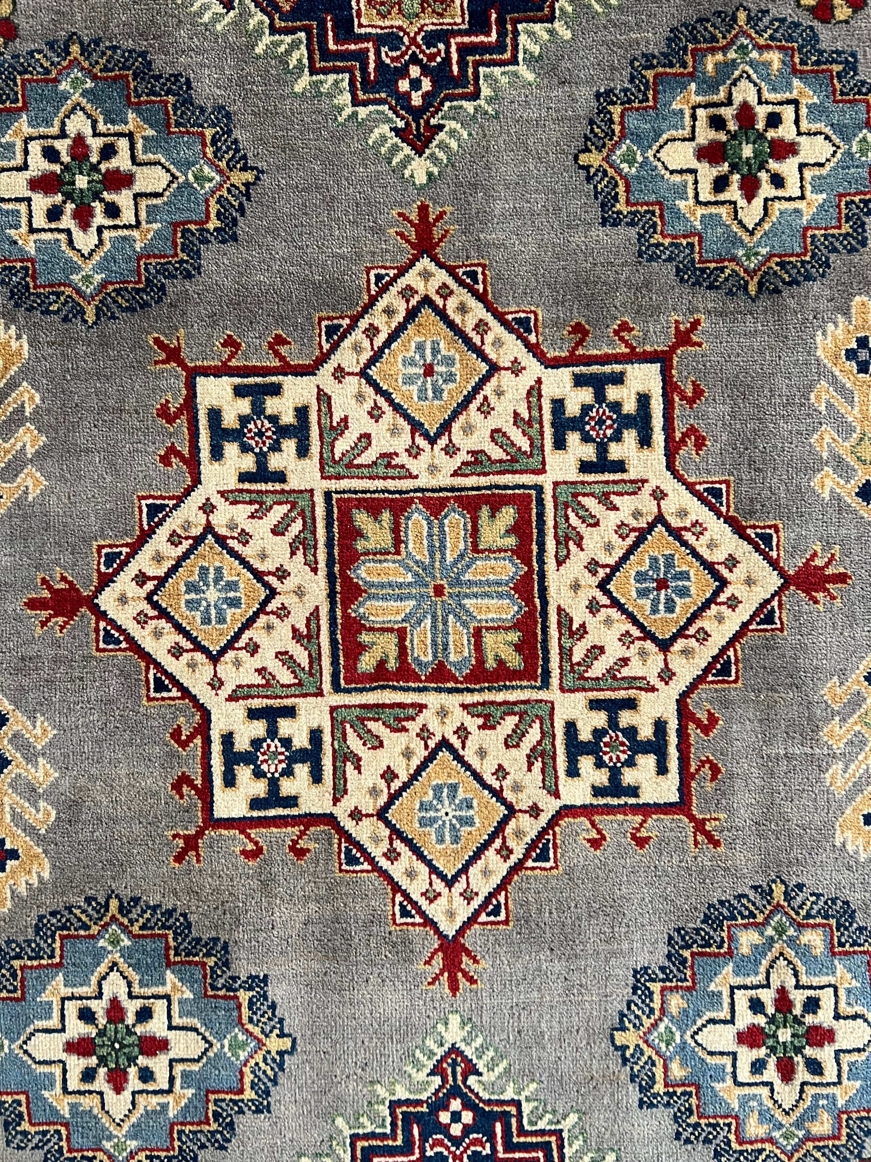 Afghani Rug 5x8 size range tribal Cream laid flat