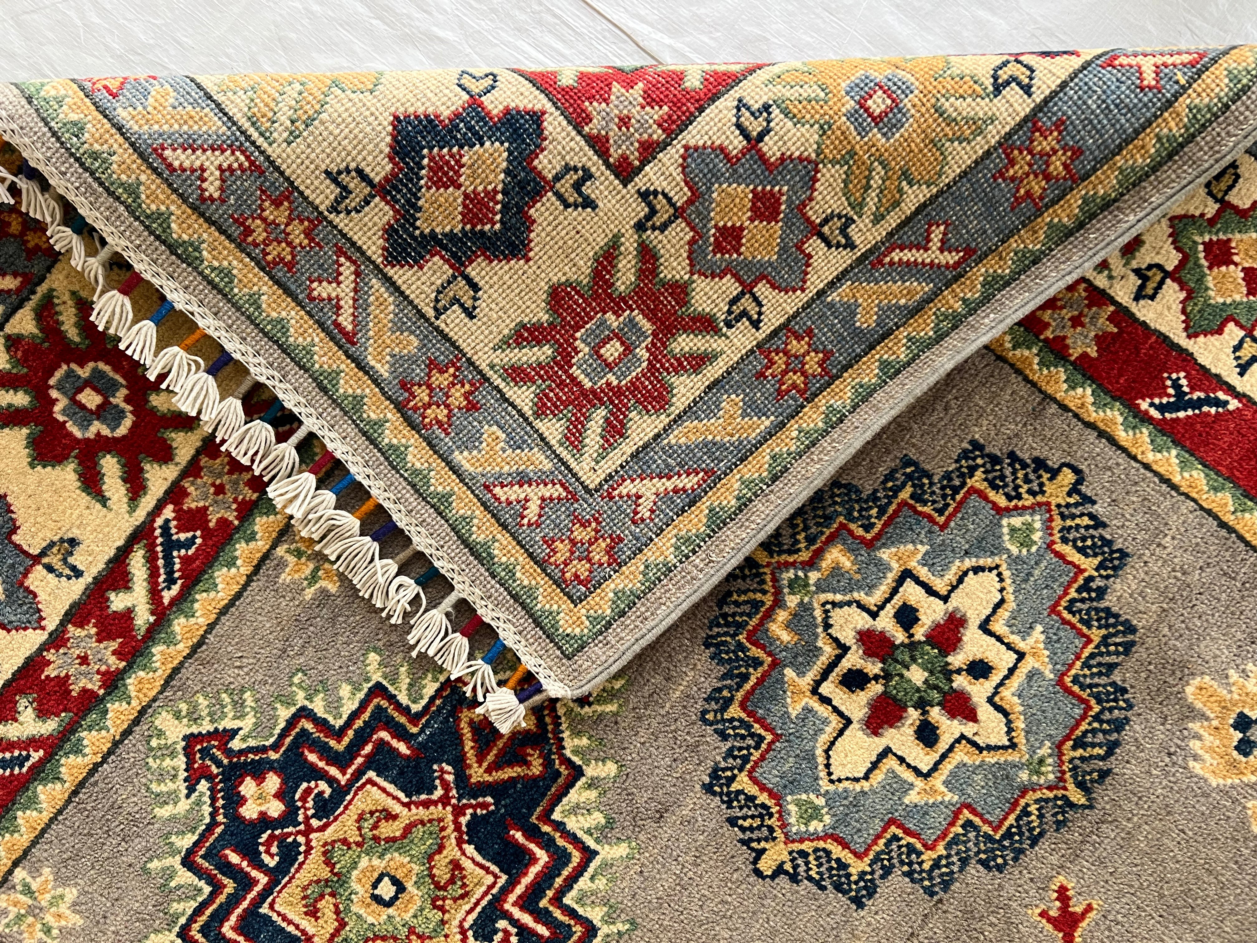 Afghani Rug 5x8 size range tribal Cream laid flat