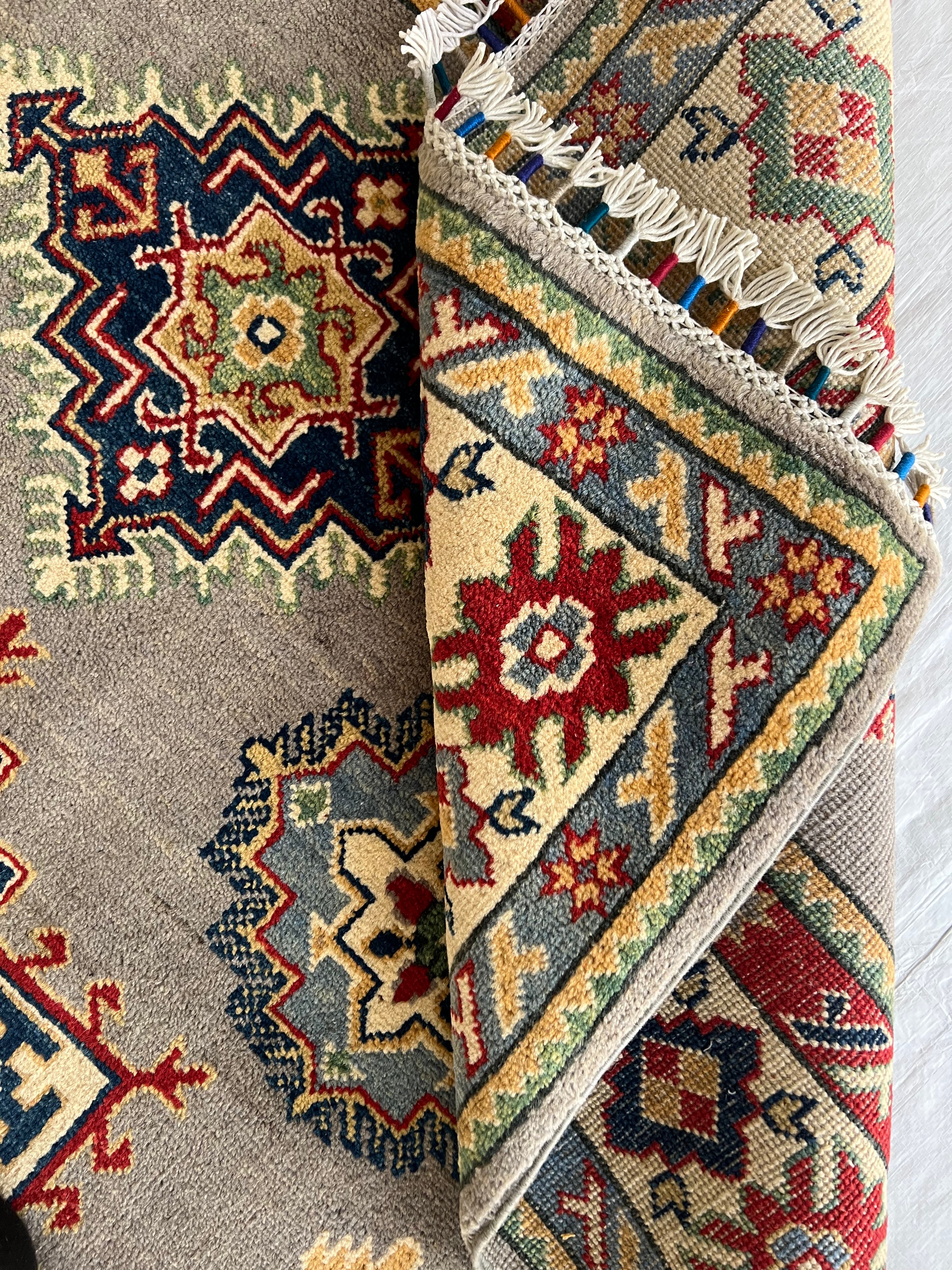 Afghani Rug 5x8 size range tribal Cream laid flat