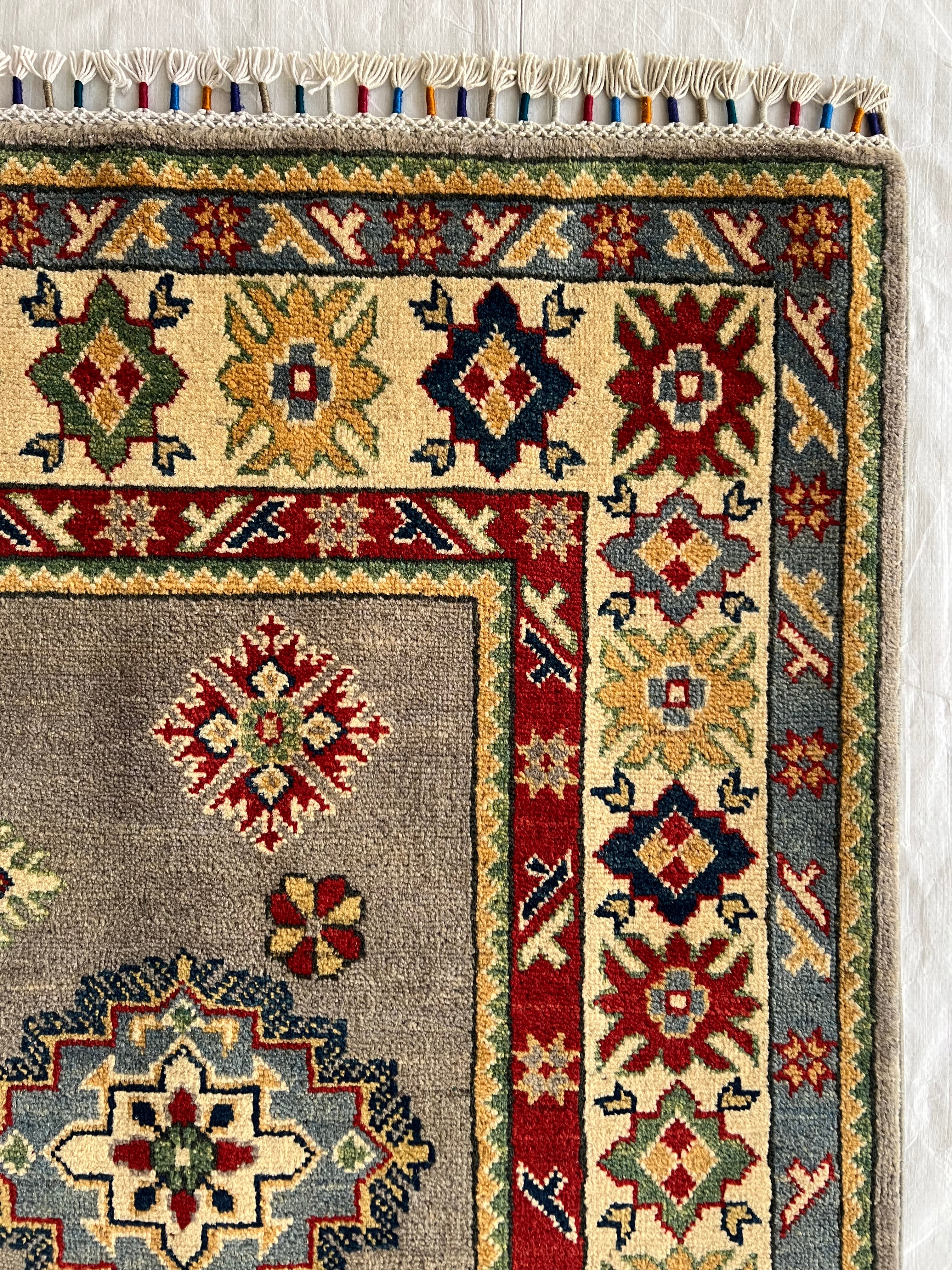 Afghani Rug 5x8 size range tribal Cream laid flat