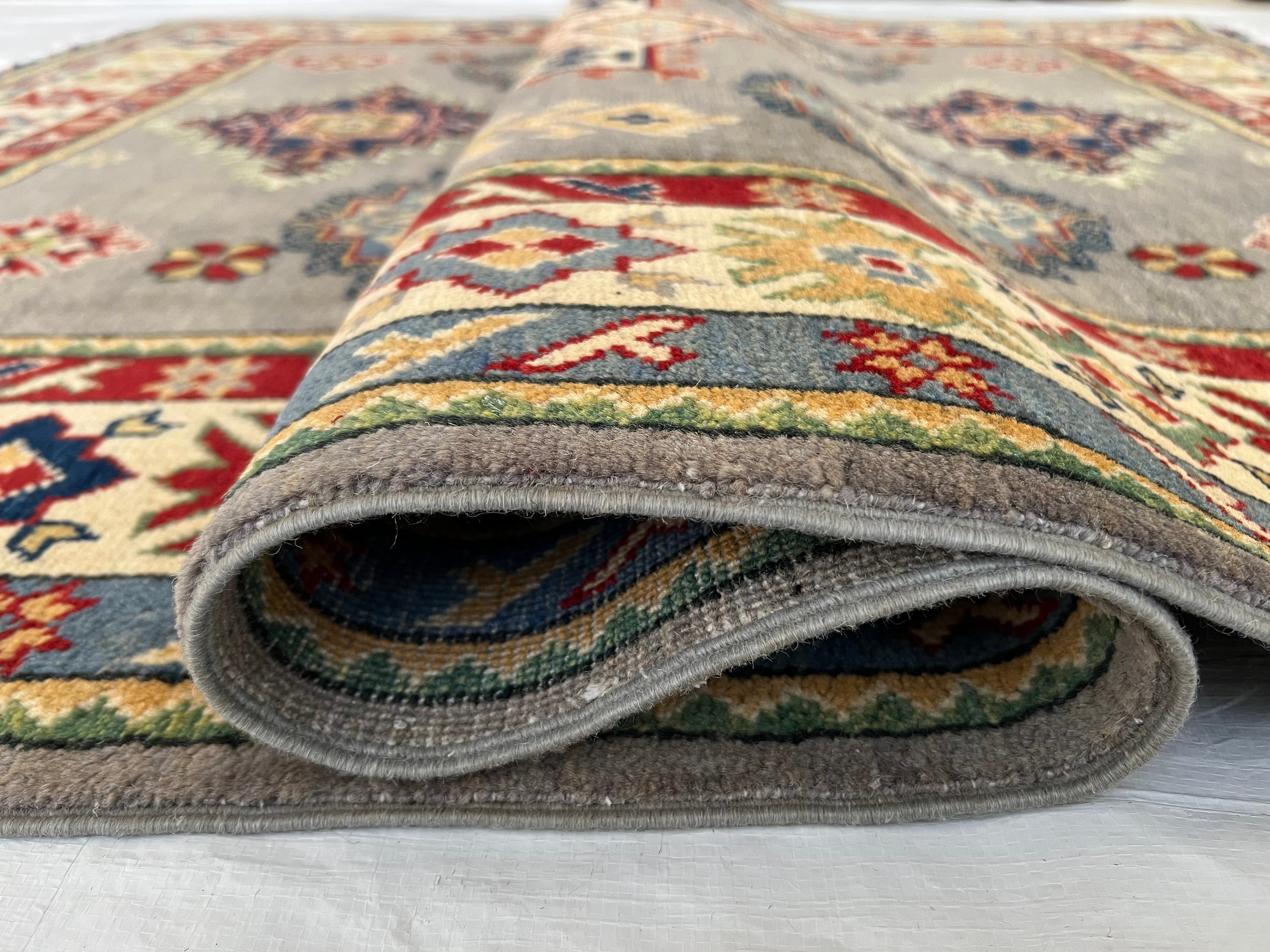 Afghani Rug 5x8 size range tribal Cream laid flat