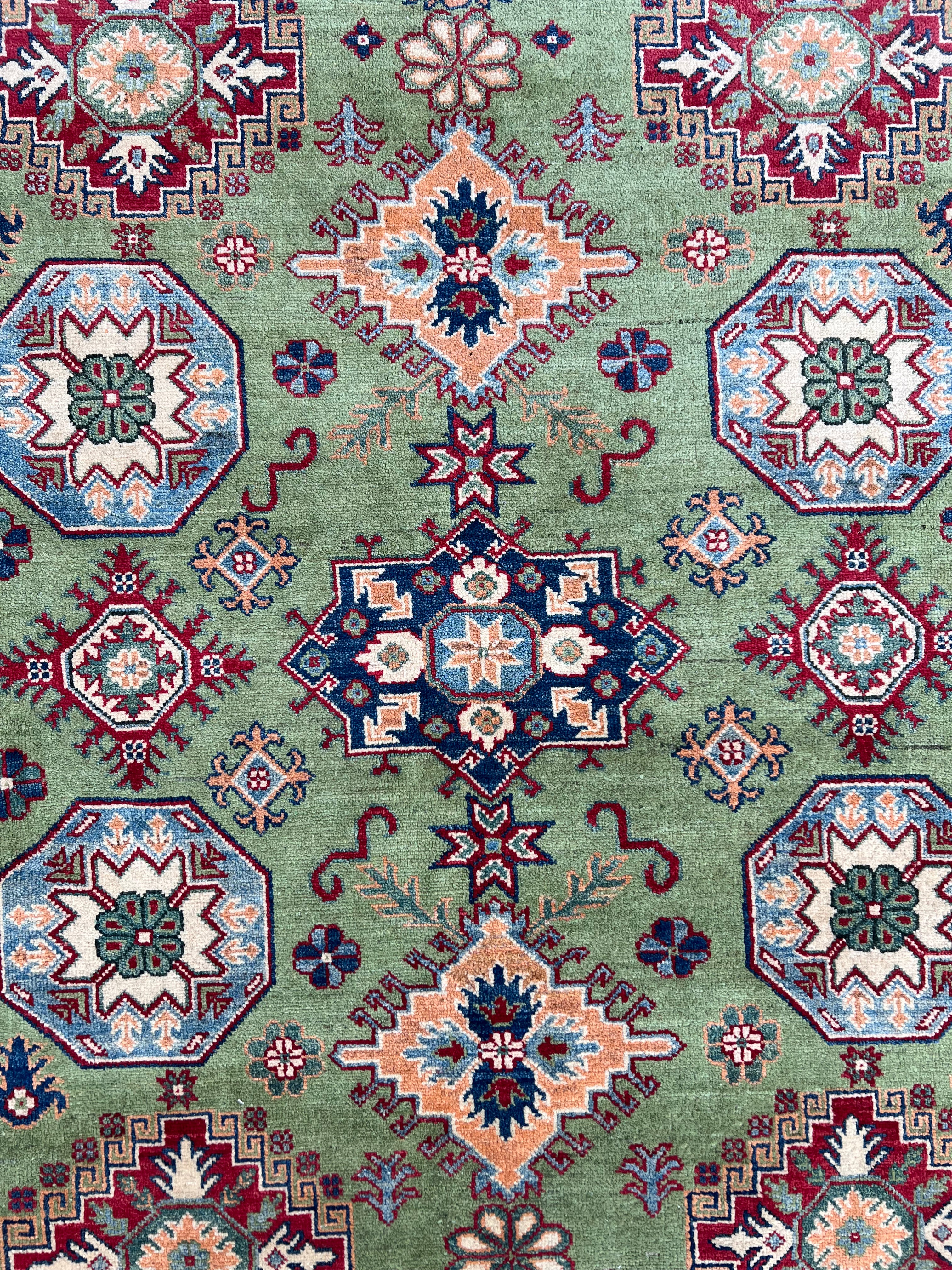 Afghani Rug 7x10 size range tribal Red Green laid flat