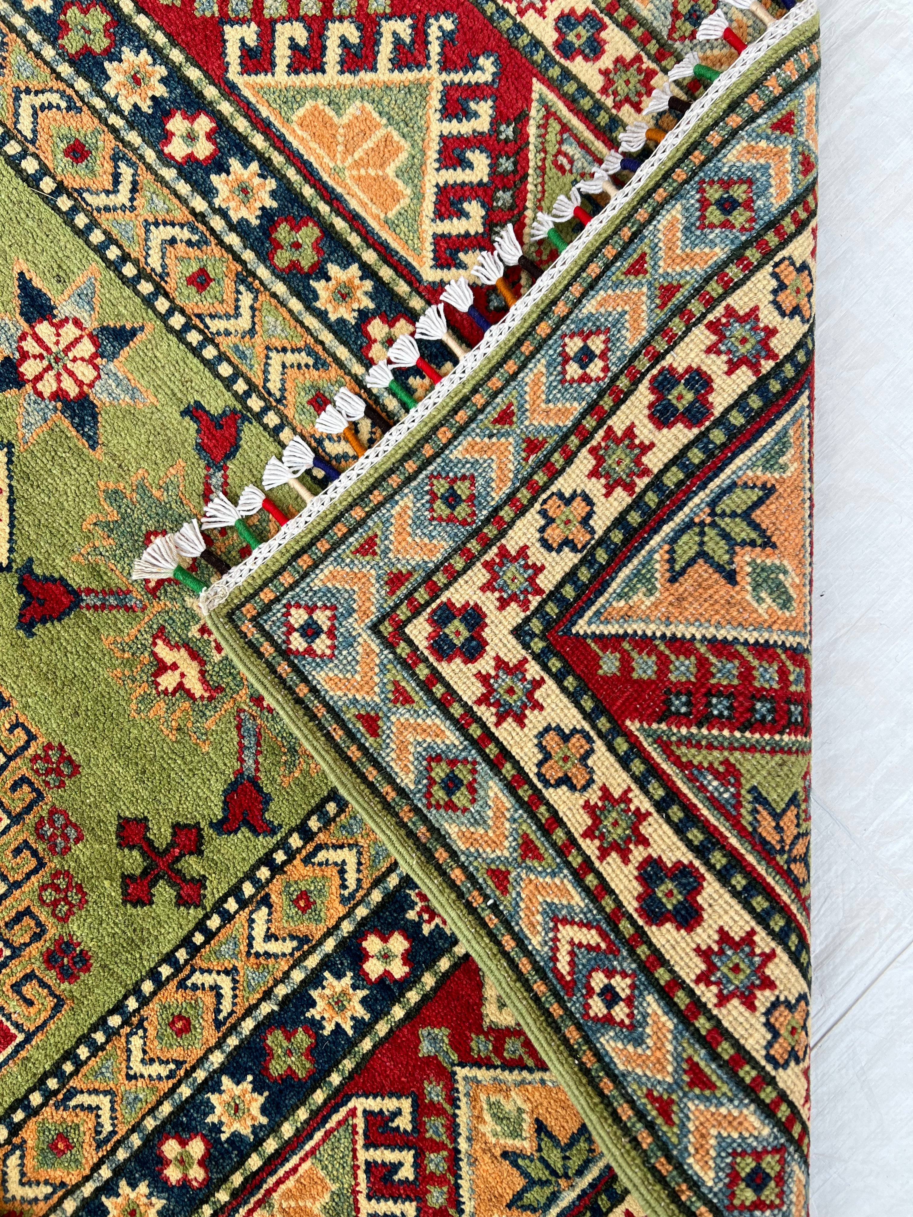 Afghani Rug 7x10 size range tribal Red Green laid flat