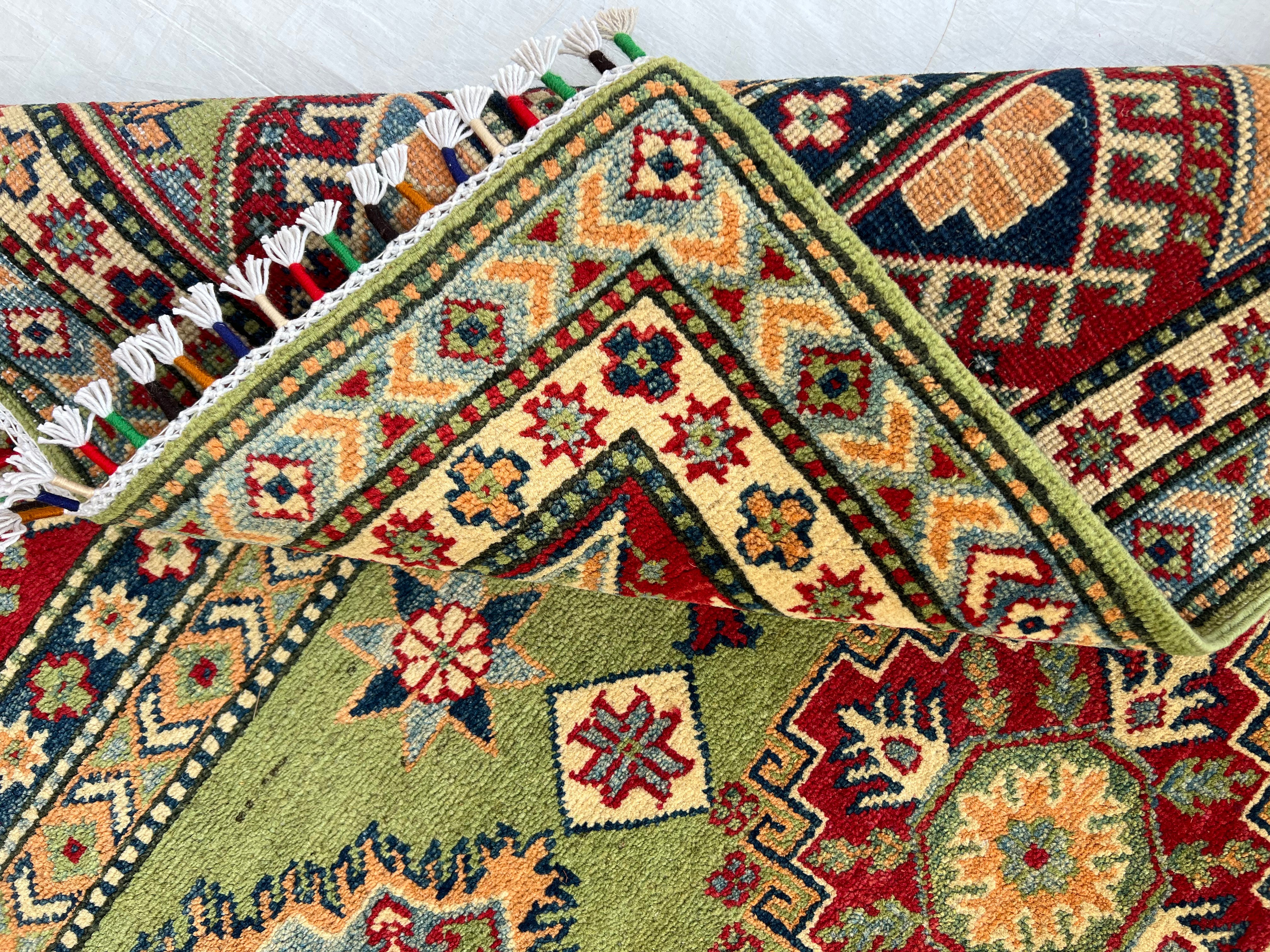 Afghani Rug 7x10 size range tribal Red Green laid flat