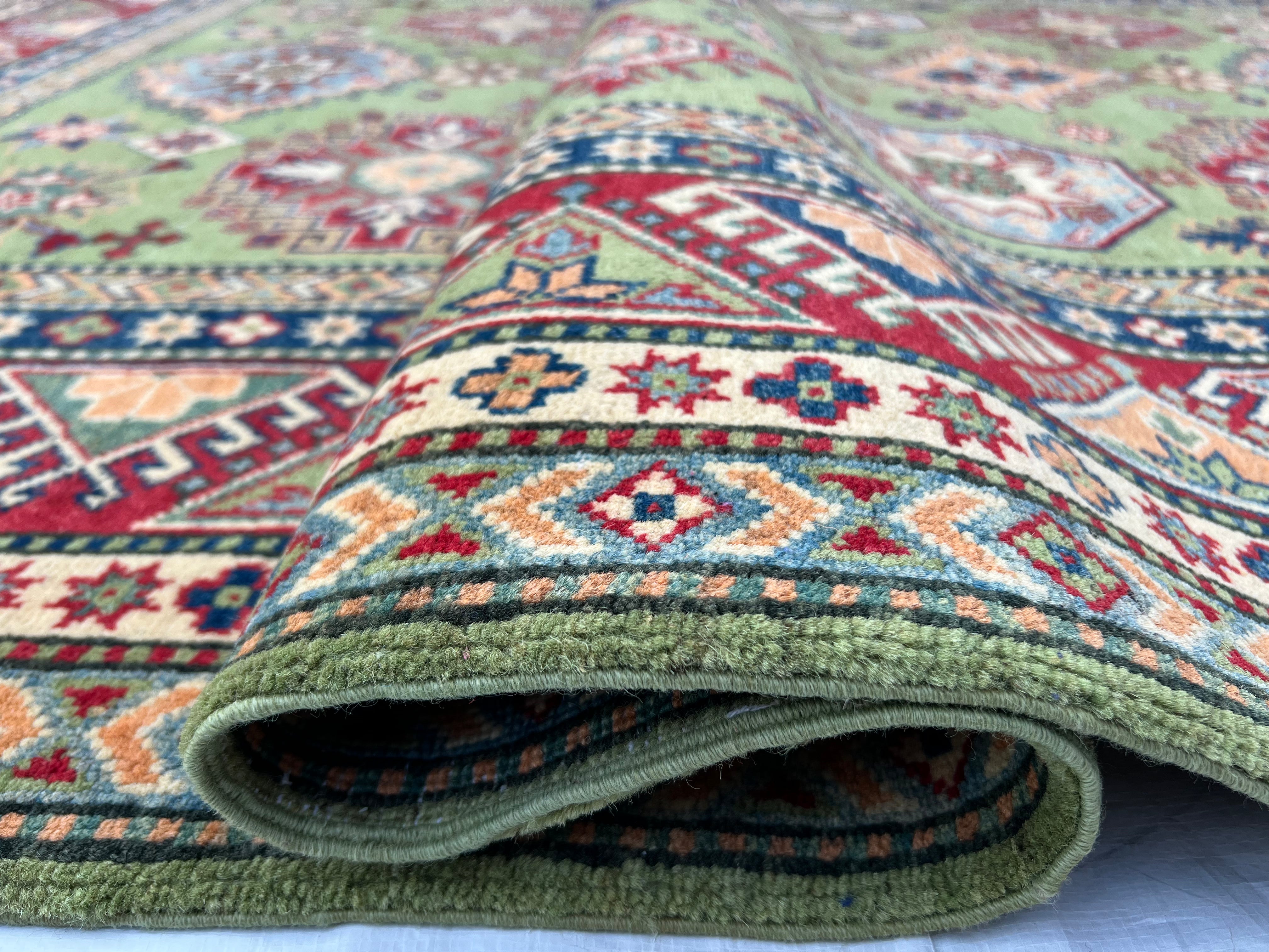 Afghani Rug 7x10 size range tribal Red Green laid flat