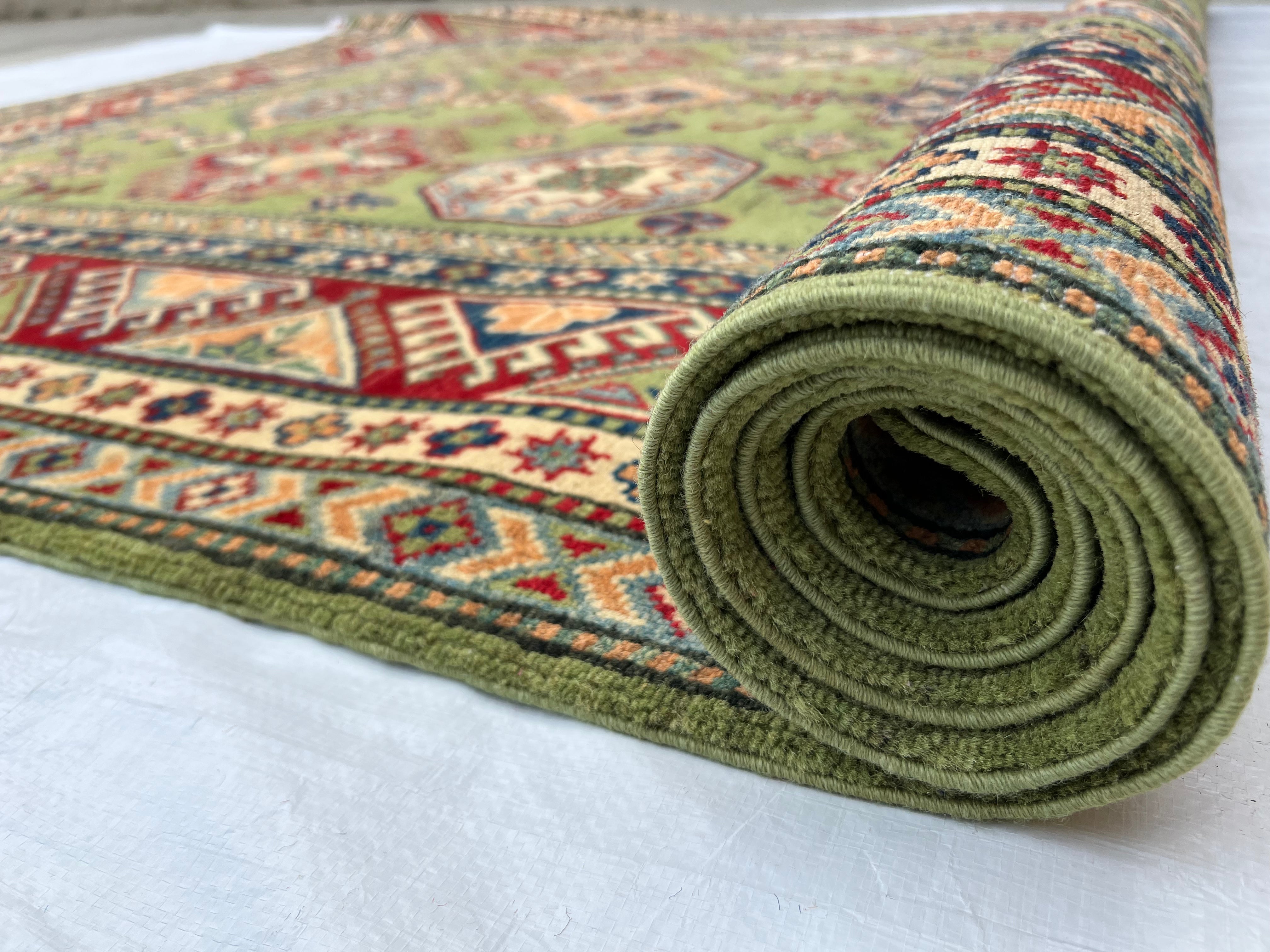 Afghani Rug 7x10 size range tribal Red Green laid flat