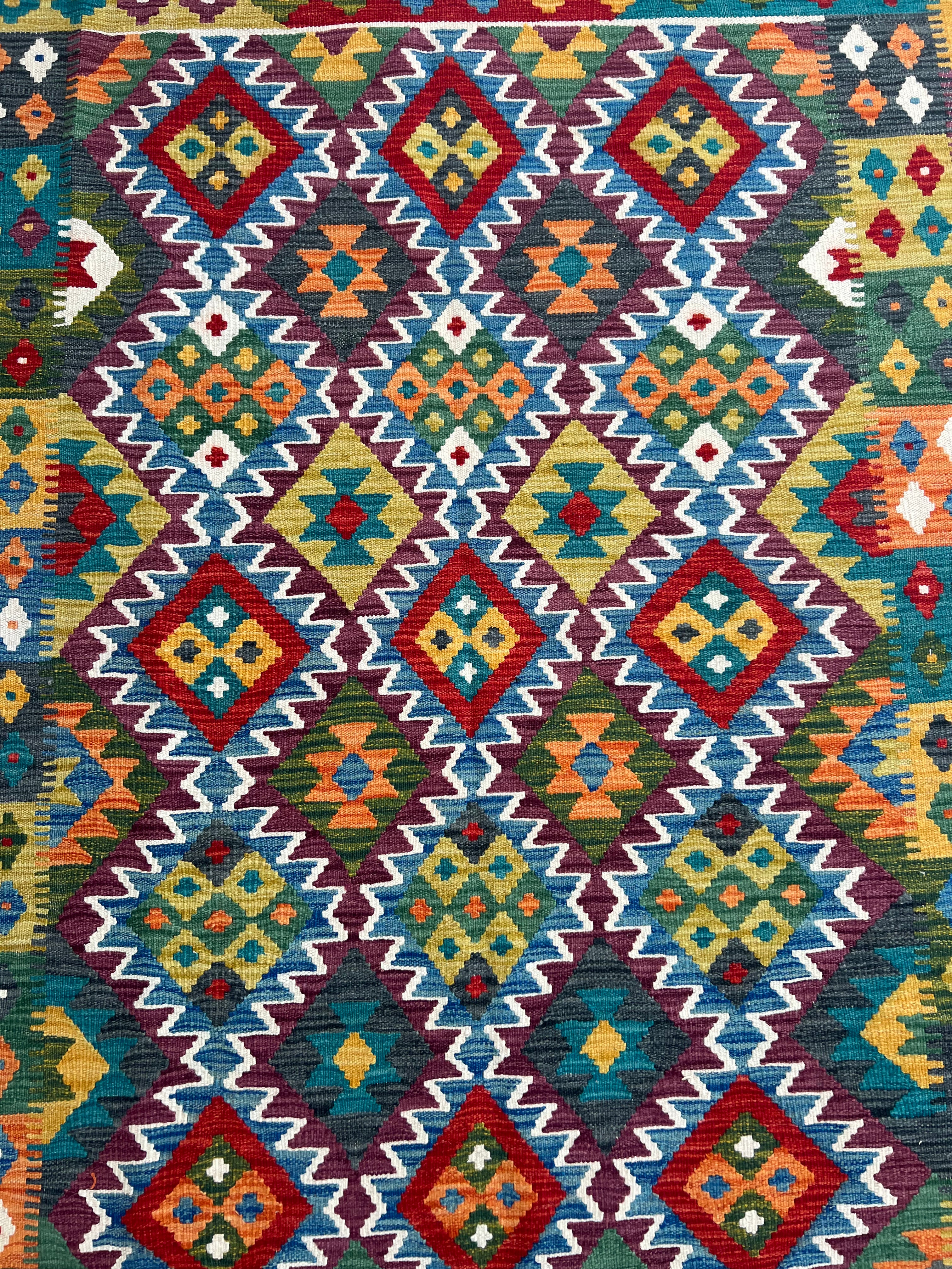Afghani Kilim 5x8 size range tribal laid flat