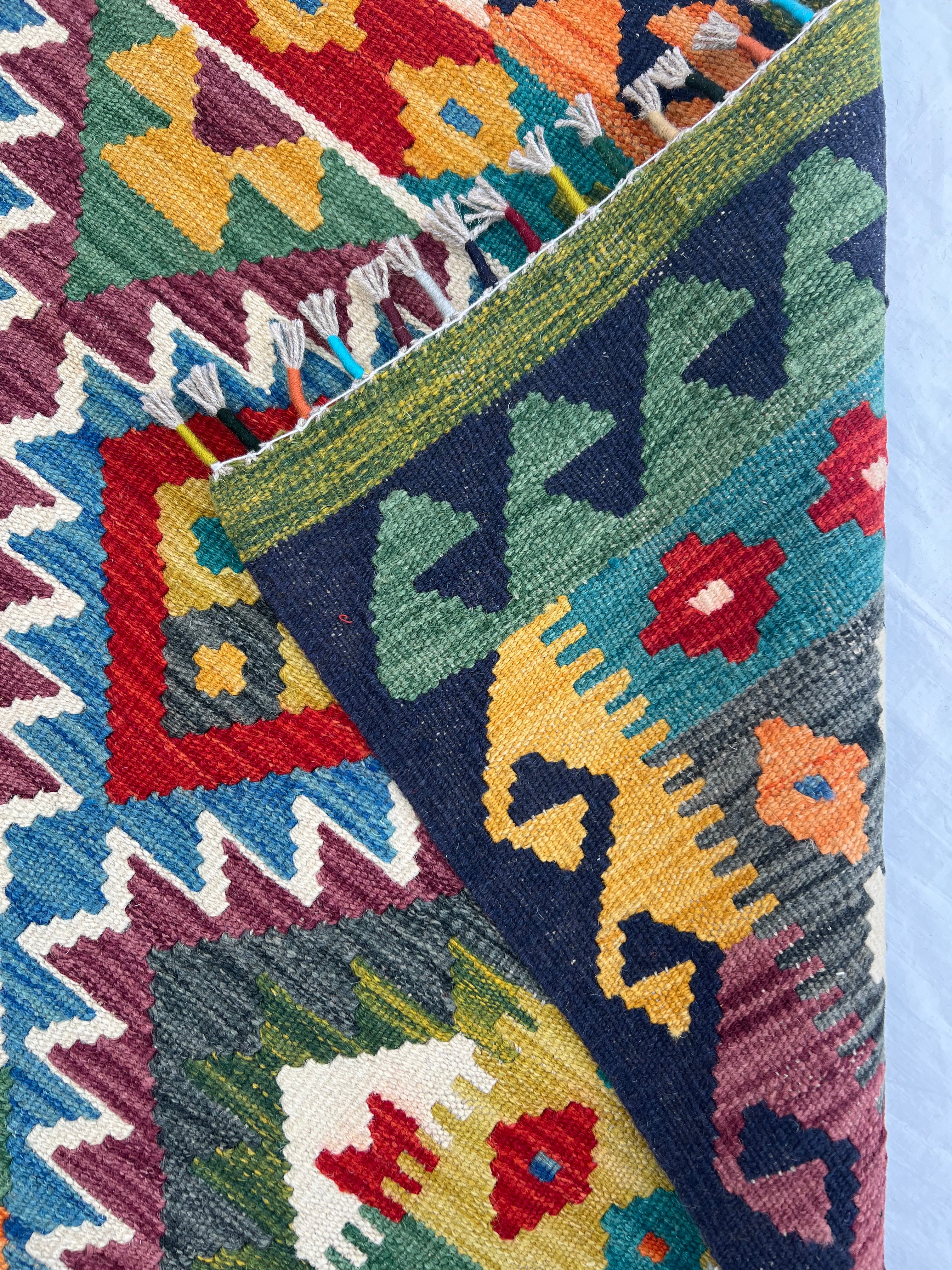 Afghani Kilim 5x8 size range tribal laid flat
