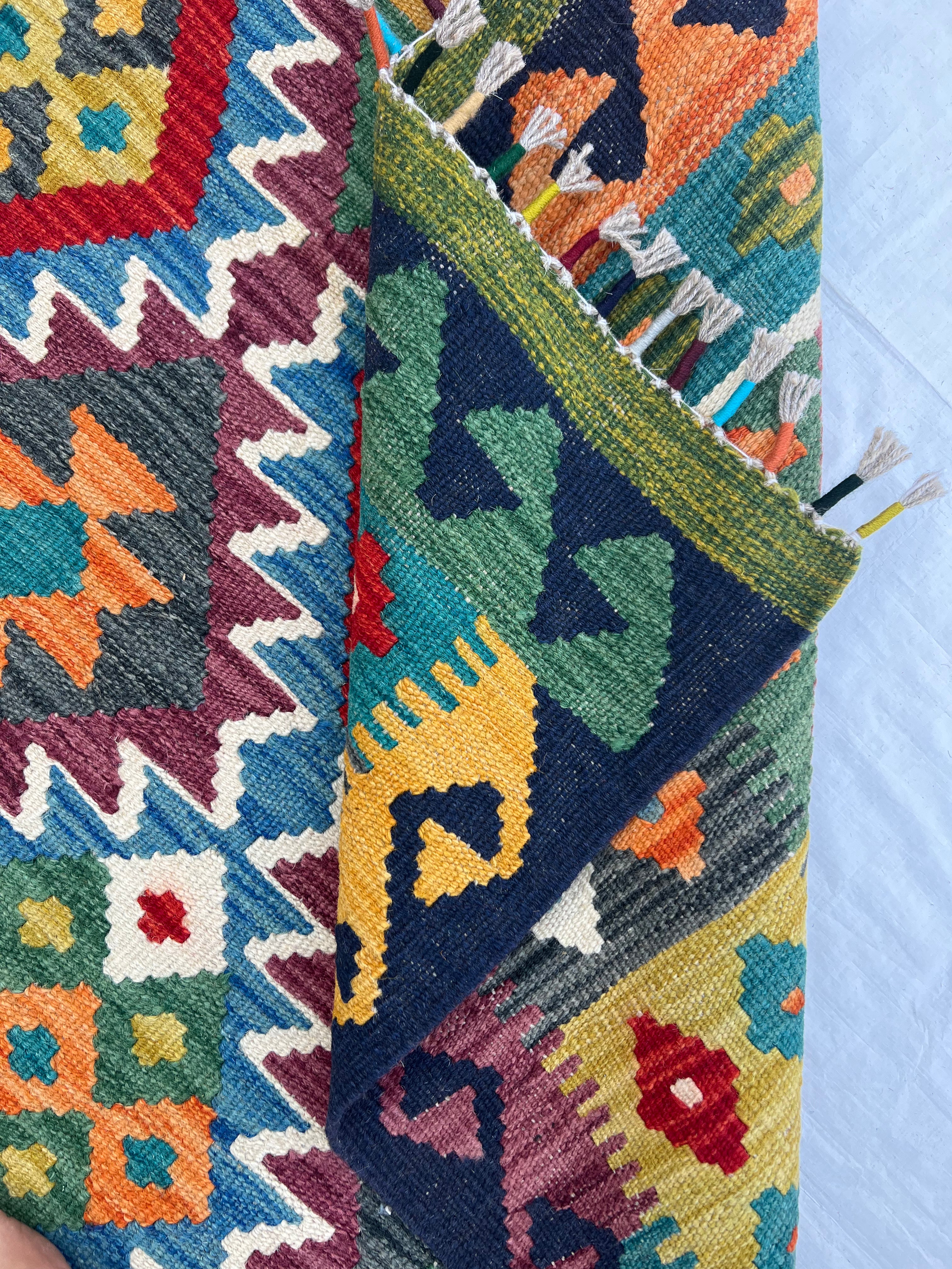 Afghani Kilim 5x8 size range tribal laid flat