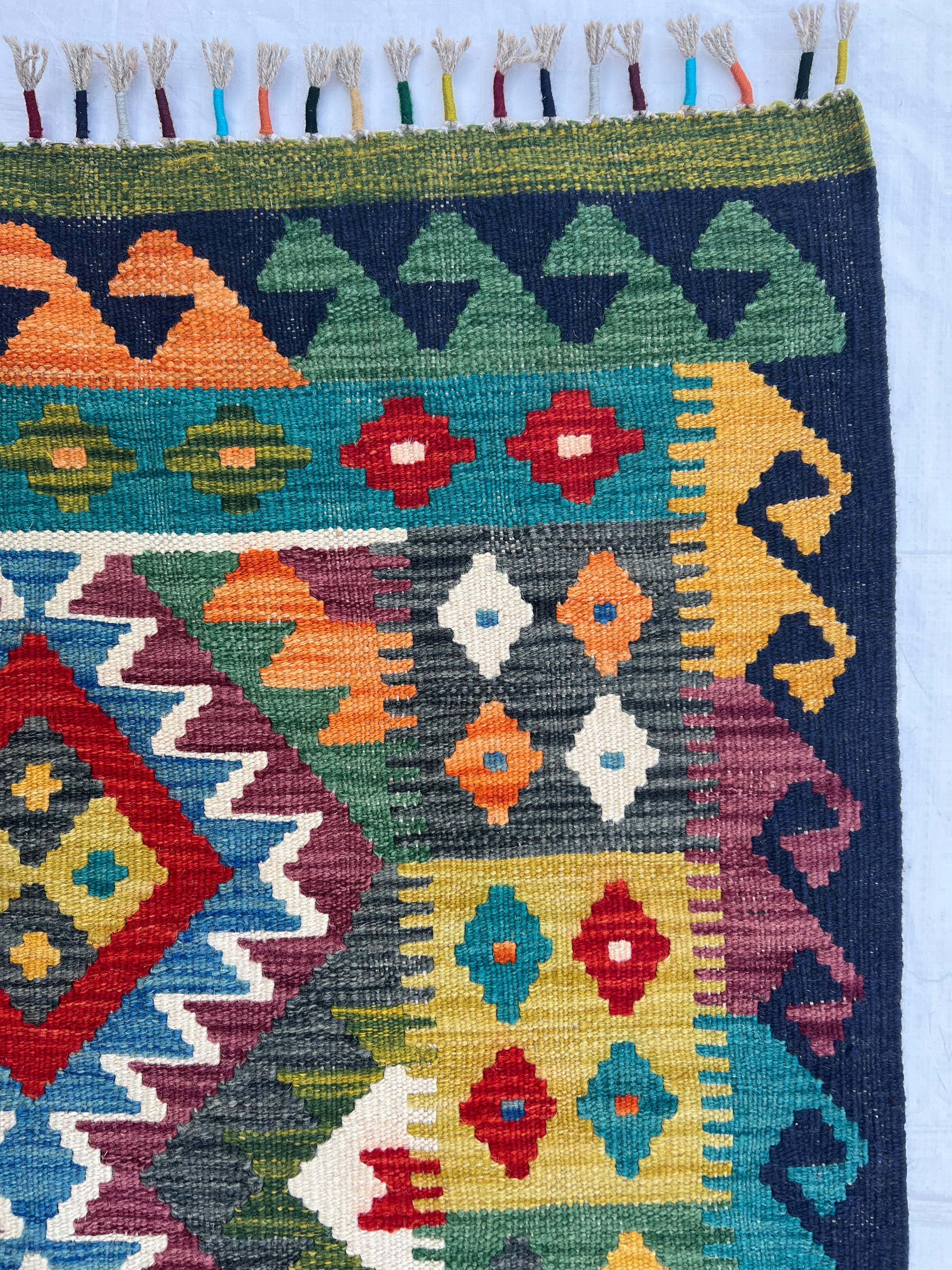 Afghani Kilim 5x8 size range tribal laid flat