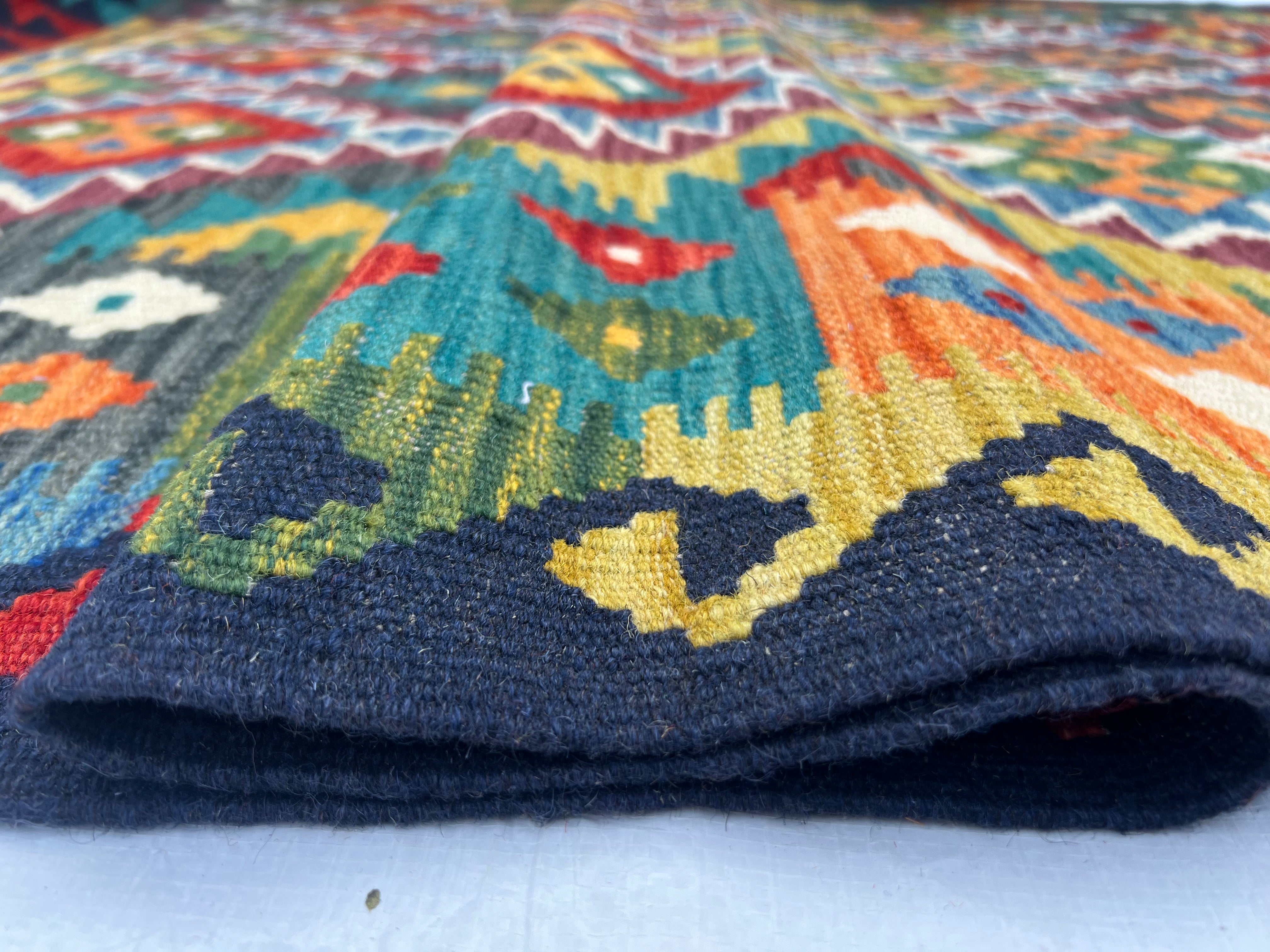 Afghani Kilim 5x8 size range tribal laid flat