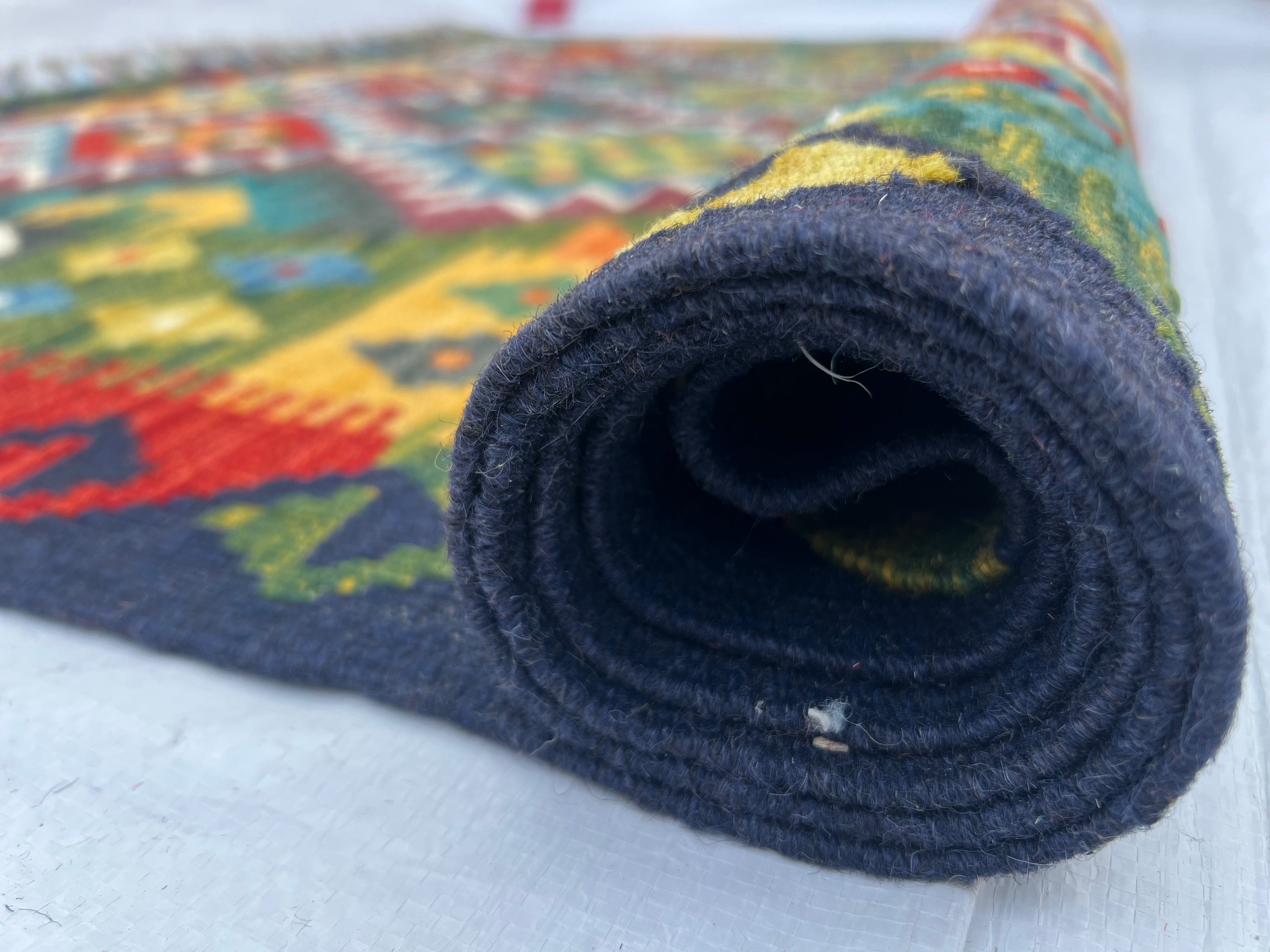 Afghani Kilim 5x8 size range tribal laid flat