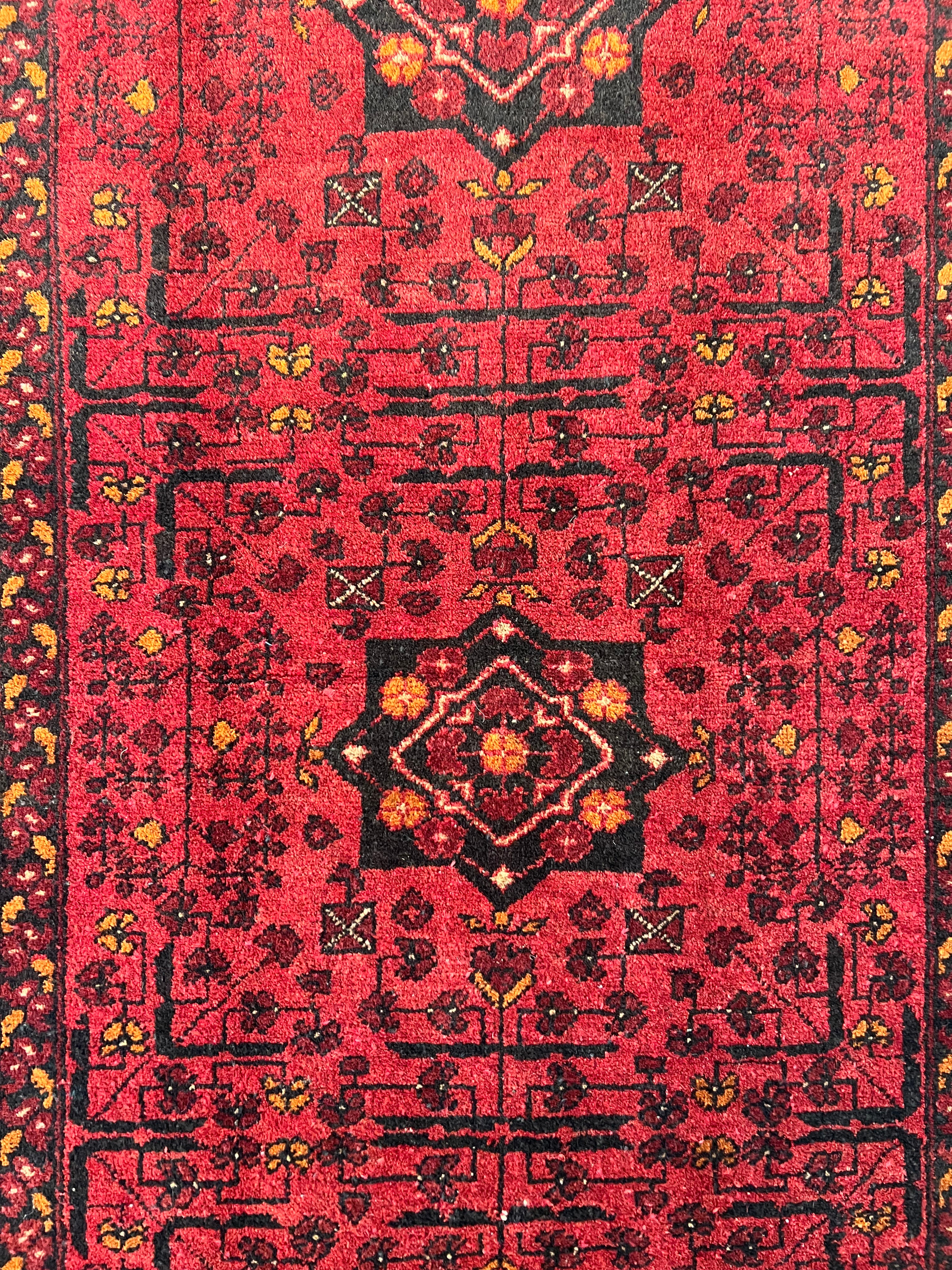 Afghani Rug 4x10 size range bukhara Red laid flat